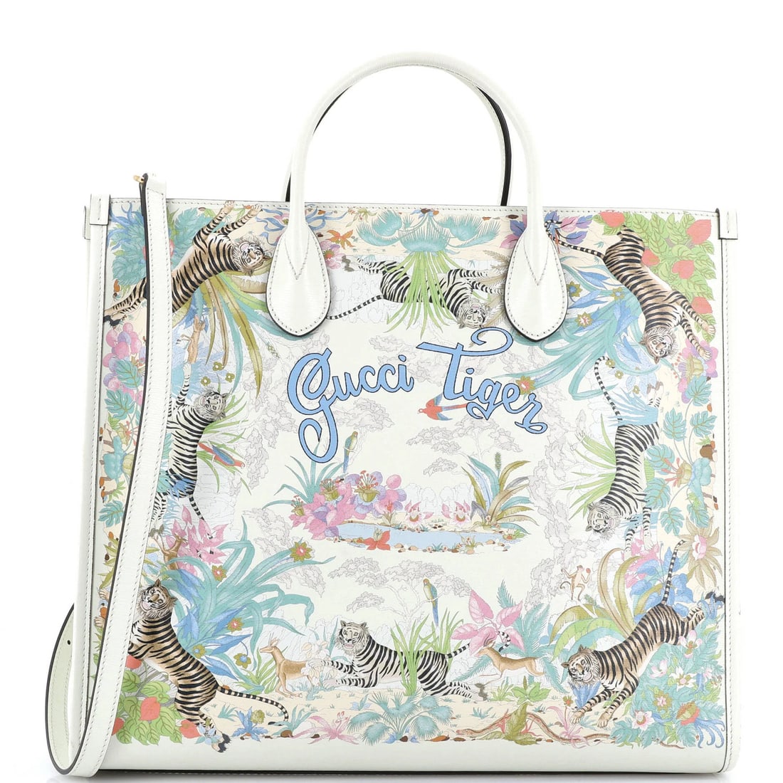 Gucci Tiger Convertible Open Tote Printed Leather Medium: Gucci Tiger Convertible Open Tote Printed Leather Medium White Gucci Tiger Convertible Open Tote with printed leather exterior, measuring 13" x 15" x 6". This medium-sized tote features a convertible