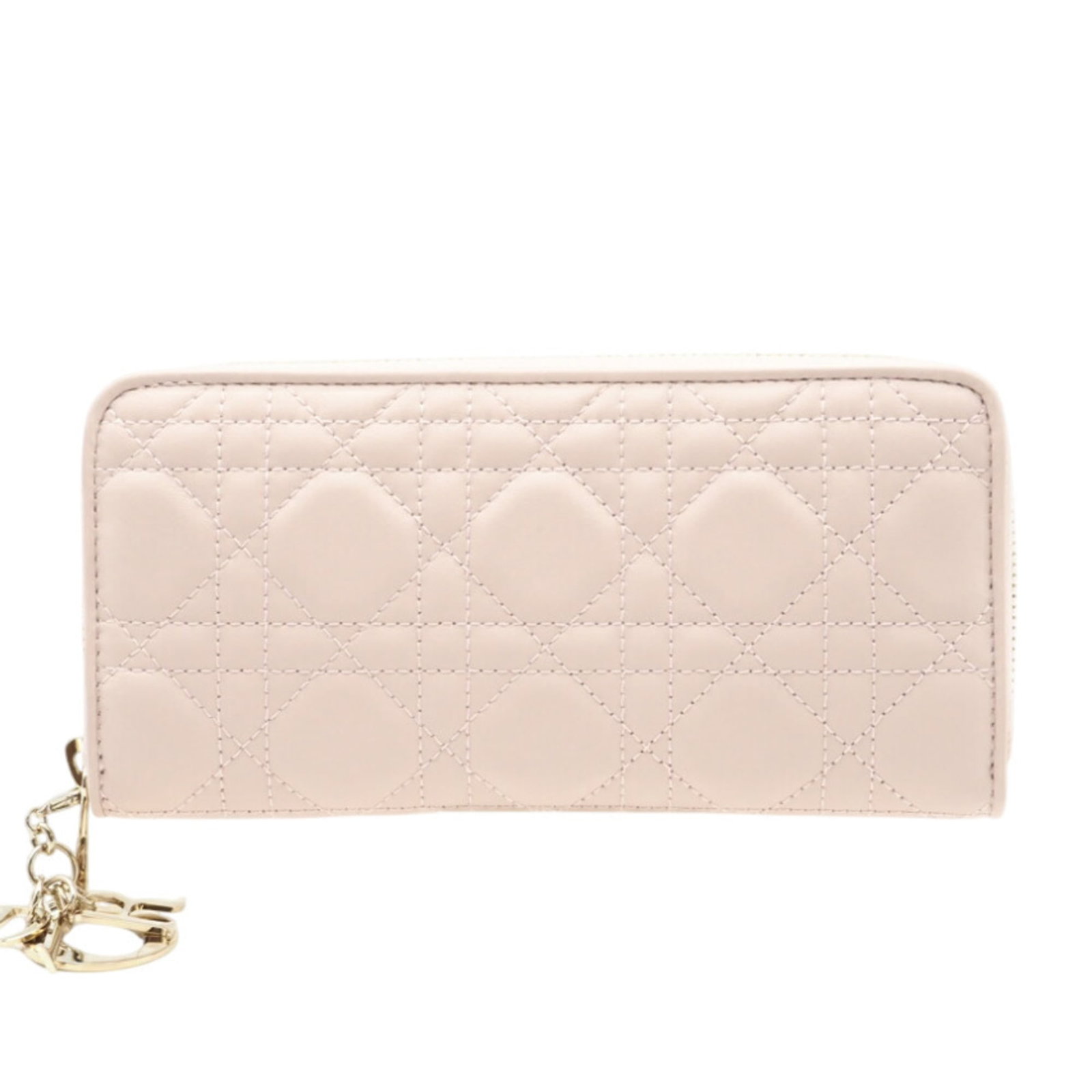 Long wallet leather bi-fold from Christian Dior: Long wallet leather bi-fold from Christian Dior Pink lambskin long wallet from Christian Dior, featuring a bi-fold design. With its classic style and elegant color, this long wallet adds a touch of