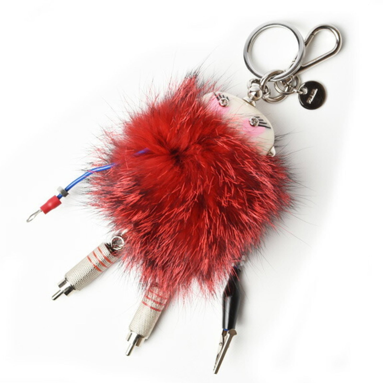 Keyring Leather Metal by Prada: Keyring Leather Metal by Prada Prada's Keyring Leather Metal boasts striking red and silver accents, combining luxurious leather with sleek metal details. Measuring 15.5cm x 4.5cm, this compact