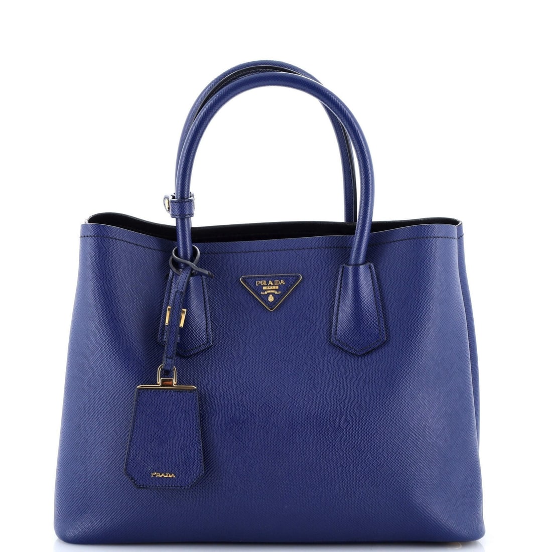 Cuir Saffiano Tote Leather Medium Prada: Cuir Saffiano Tote Leather Medium Prada Blue Cuir Saffiano Tote Leather Medium Prada. This medium-sized tote features the iconic Saffiano leather exterior, with a blue color and gold hardware