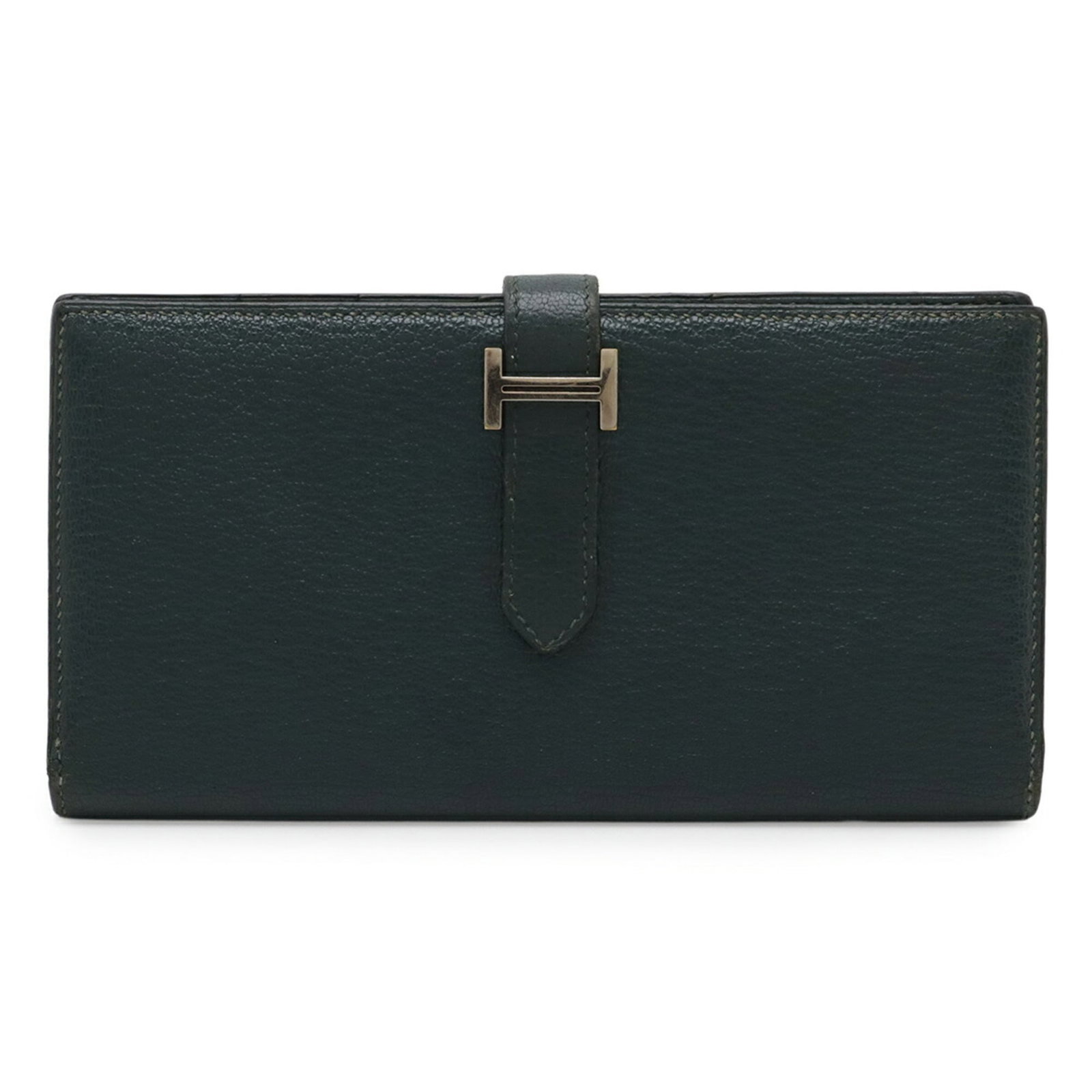 Chevre leather bi-fold wallet by Hermes: Chevre leather bi-fold wallet by Hermes Chevre leather bi-fold wallet by Hermes features a unique blend of style and sophistication, with its distinctive green color adding a touch of elegance. Made f