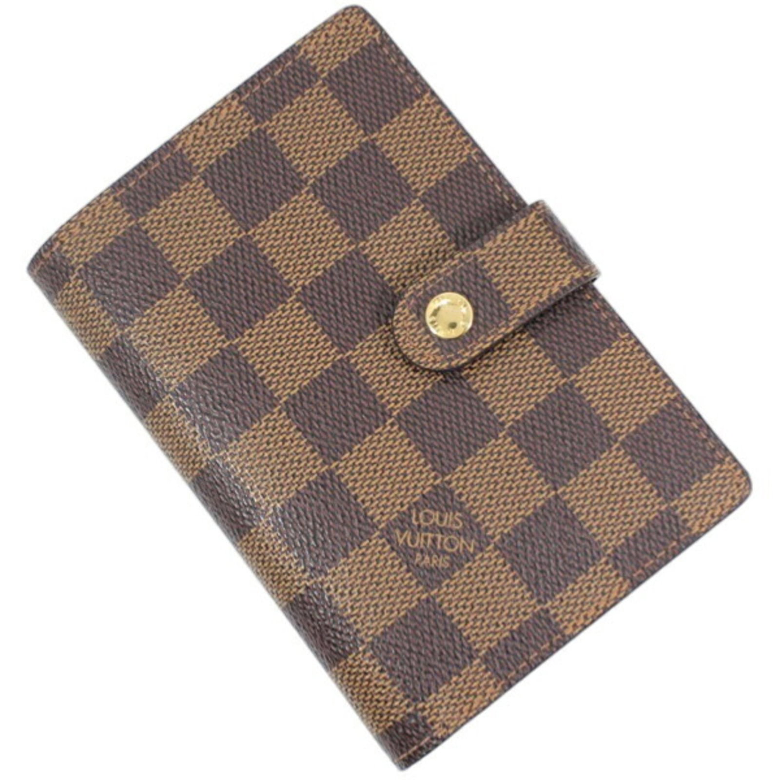 Damier Canvas Bi Fold Wallet Louis Vuitton: Damier Canvas Bi Fold Wallet Louis Vuitton Damier Canvas Bi Fold Wallet Louis Vuitton - A stylish and compact wallet featuring the iconic Damier canvas pattern, with a bi-fold design that opens to