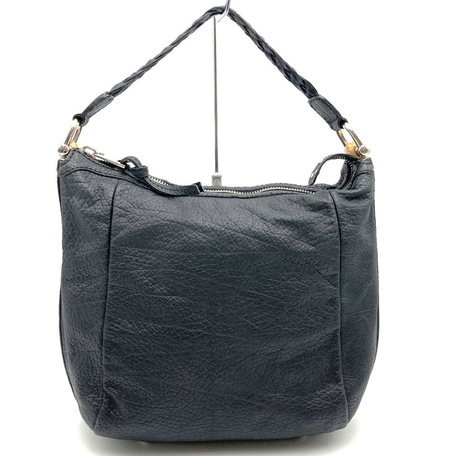 Bamboo leather shoulder bag handbag by Gucci: Bamboo leather shoulder bag handbag by Gucci Bamboo leather shoulder bag by Gucci, featuring a unique blend of sustainable materials and timeless design. This black handbag boasts a sleek zipper closu