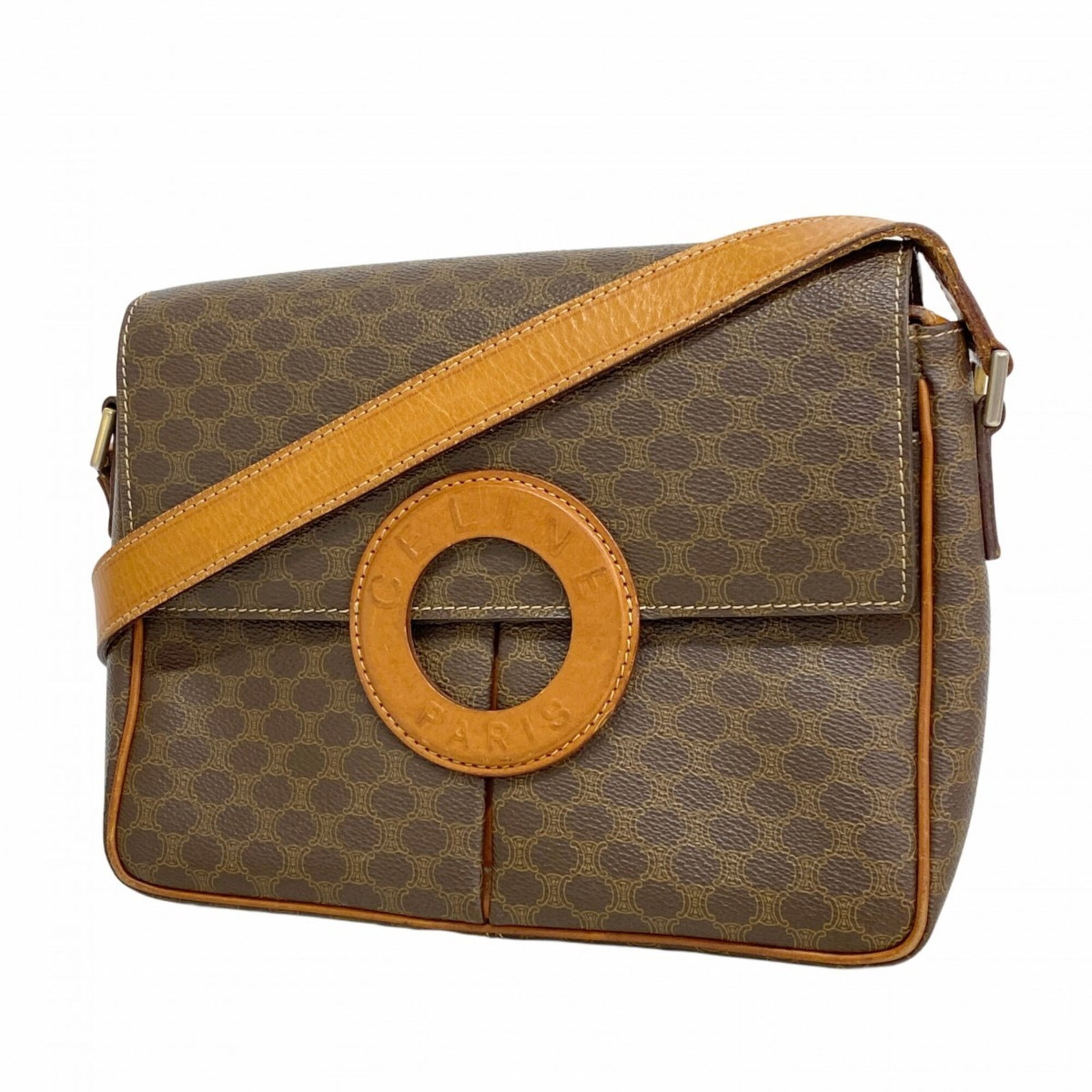 PVC Celine Bag Shoulder: PVC Celine Bag Shoulder PVC Celine Bag Shoulder in Brown with Gold Hardware. This used shoulder bag features a durable PVC material and gold hardware, giving it a sleek and sophisticated look. With
