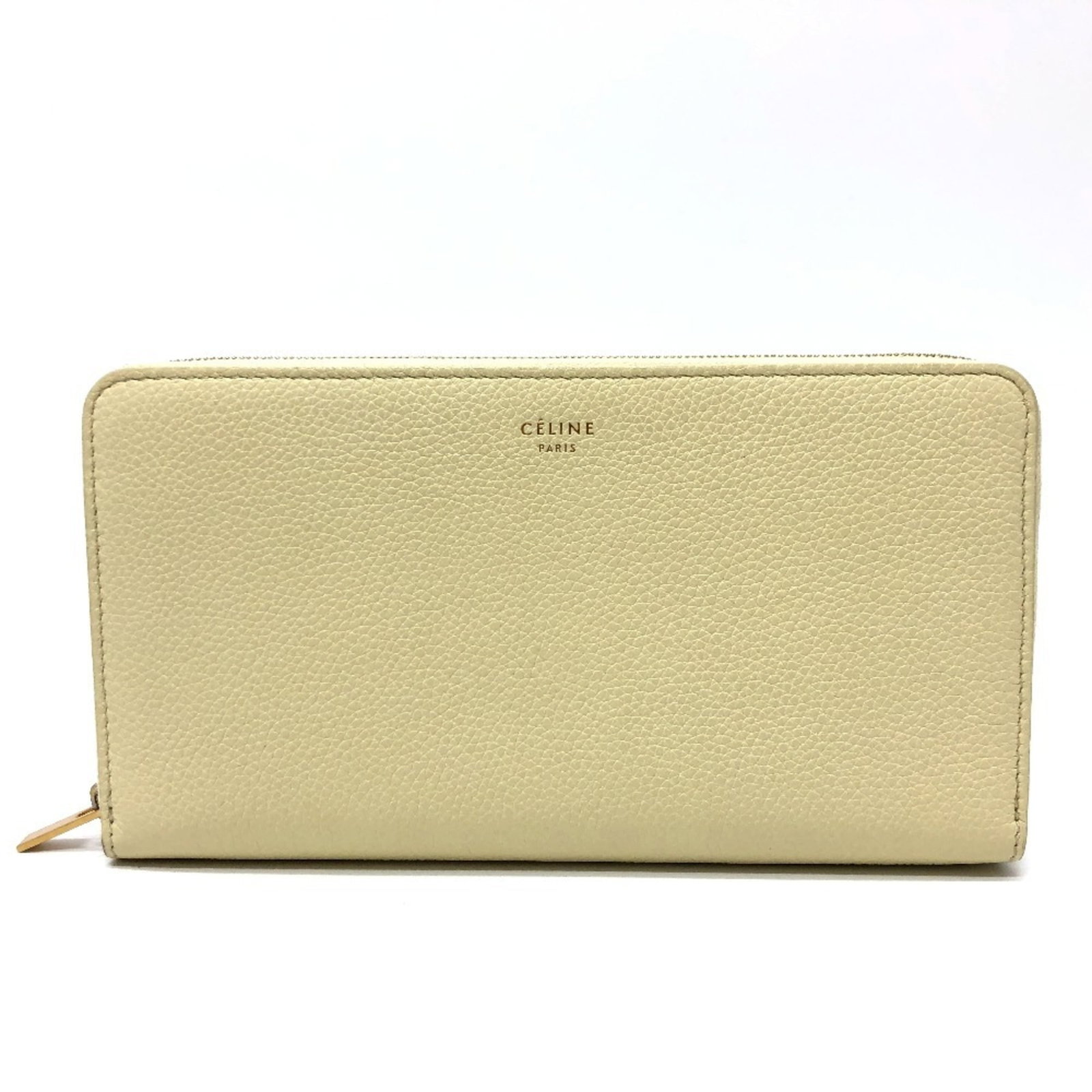 Leather Bi Fold Wallet Celine: Leather Bi Fold Wallet Celine This Celine leather bi-fold wallet boasts a classic design with clean lines and a timeless beige color. Made from high-quality leather, it features a long, spacious