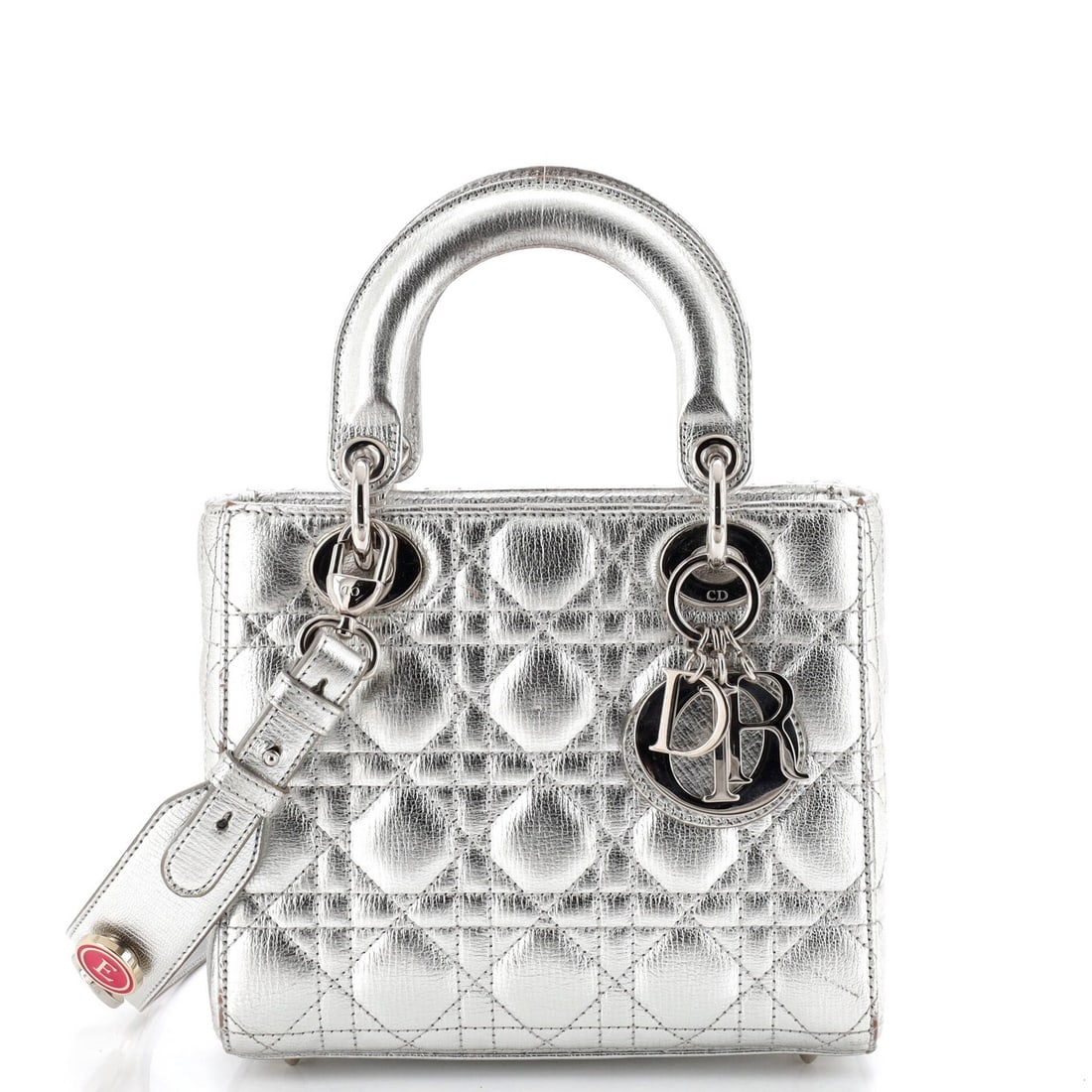 Christian Dior Lady Dior Metallic Cannage Quilt Leather Bag: Christian Dior Lady Dior Metallic Cannage Quilt Leather Bag The Christian Dior Lady Dior Metallic Cannage Quilt Leather Bag boasts a striking silver exterior with intricate metallic details,