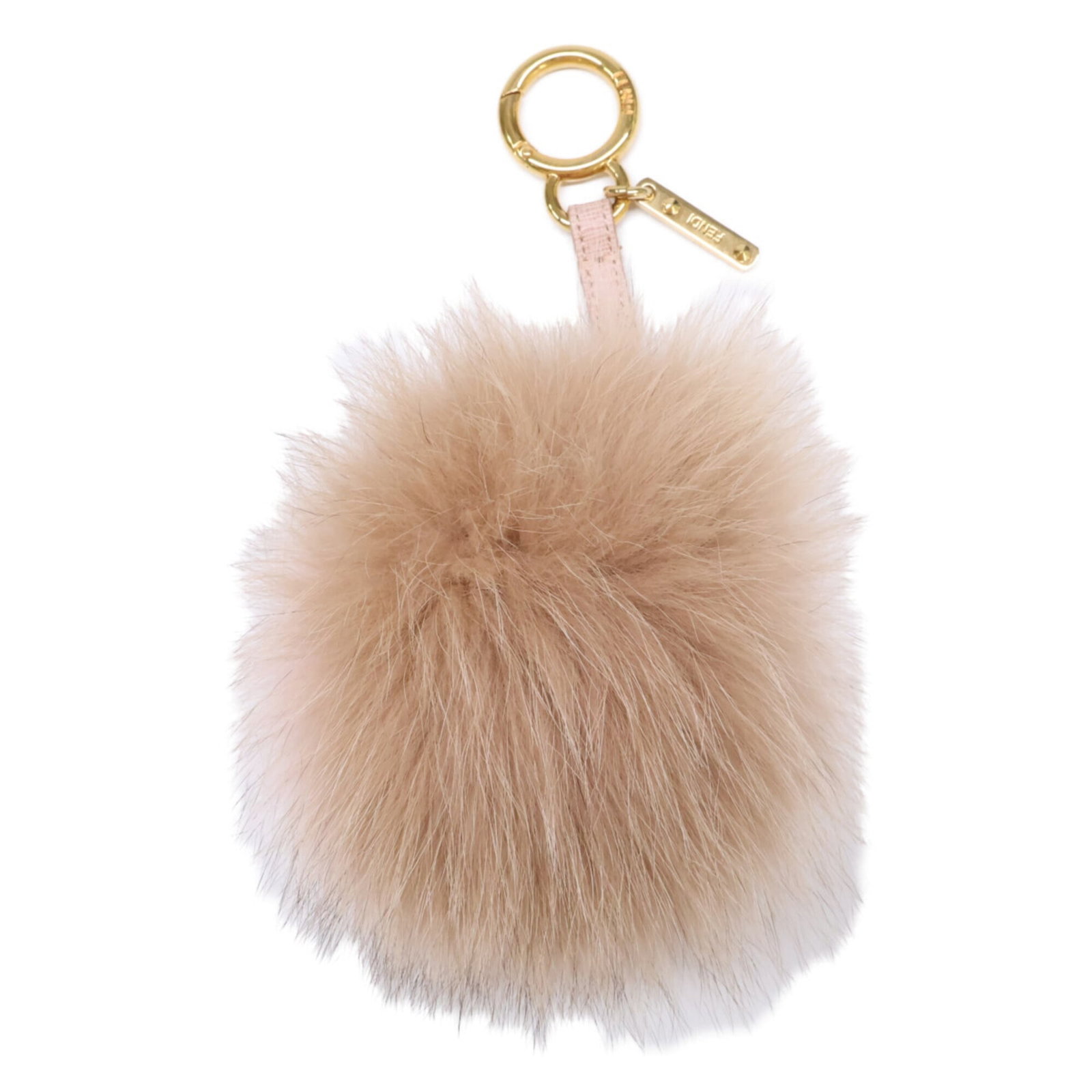 Fur keyring by Fendi: Fur keyring by Fendi Fur keyring by Fendi, featuring a natural beige and pink color combination. The item has traces of usage with scratches and dirt visible, but remains in good condition overall. A