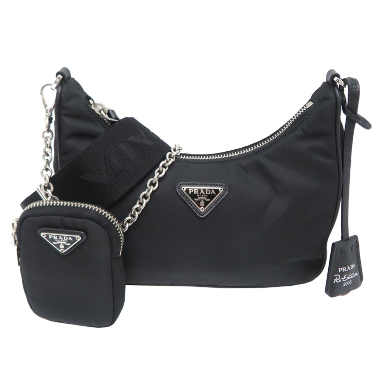 Shoulder Bag Nylon by Prada: Shoulder Bag Nylon by Prada Black Prada Nylon Shoulder Bag with a classic design, measuring 15cm x 21cm x 5.5cm, featuring a durable nylon material and a timeless style that suits everyday use. The