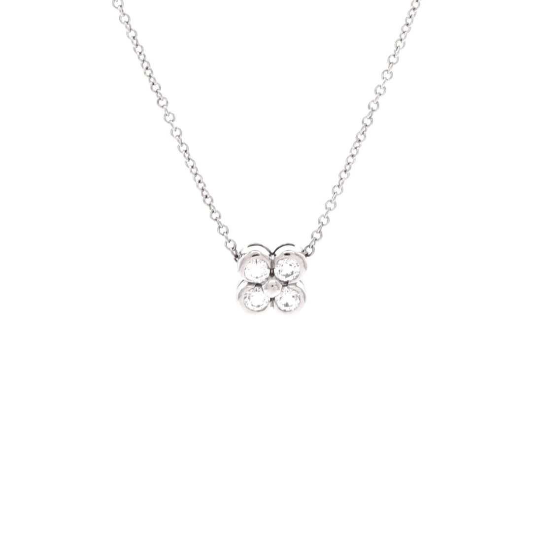 Tiffany & Co. Flower Pendant Necklace Platinum and Diamonds: Tiffany & Co. Flower Pendant Necklace Platinum and Diamonds Tiffany & Co.'s iconic Flower Pendant Necklace shines in platinum, adorned with a sparkling diamond. This elegant necklace boasts 16 inches 