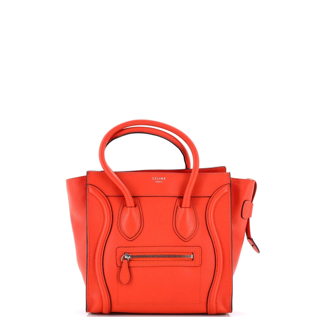 Celine Luggage Bag Grainy Leather Micro: Celine Luggage Bag Grainy Leather Micro The Celine Luggage Bag Grainy Leather Micro in orange features a unique grainy leather exterior with minor scuffs, edge wear, and corner wear. Measuring 10" x