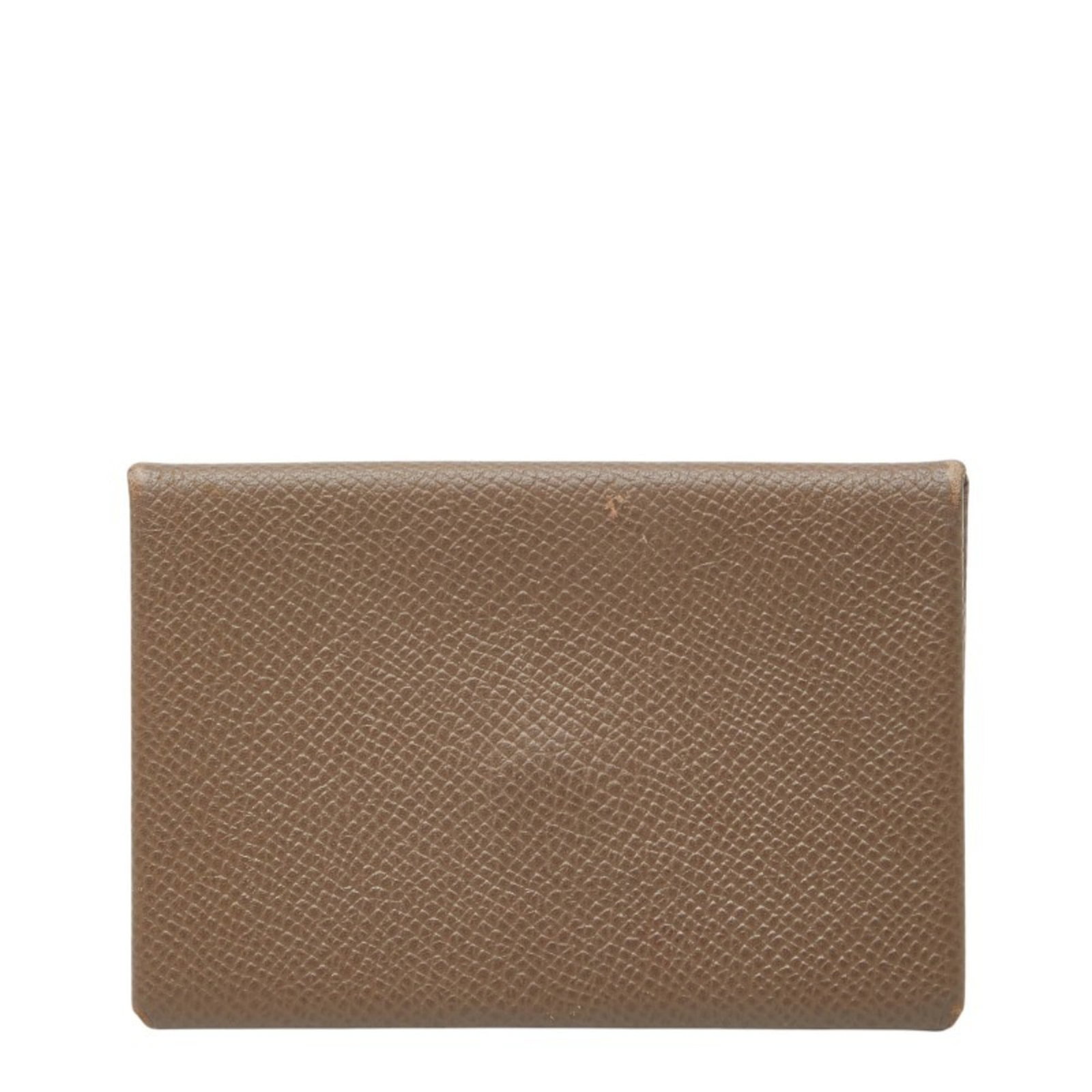 Epsom leather card case from Hermes: Epsom leather card case from Hermes Epsom leather card case from Hermes, featuring a timeless grayish color and subtle scratches from previous use. This pre-owned item showcases the classic design of