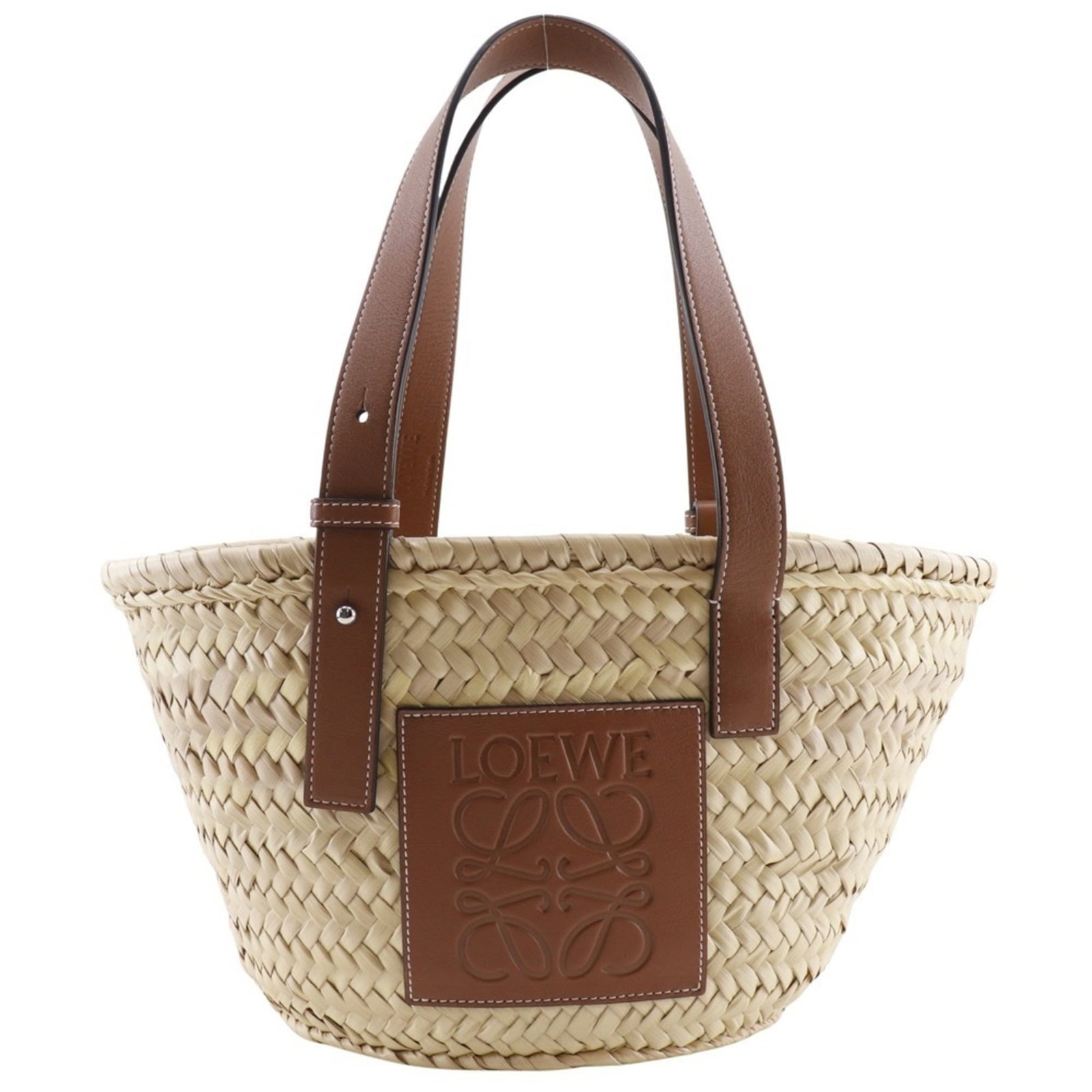 Loewe Raffia Tote Leather Bag: Loewe Raffia Tote Leather Bag The Loewe Raffia Tote Leather Bag is a stylish and unique basket tote made from high-quality raffia and leather. Its natural beige and brown color combination adds a