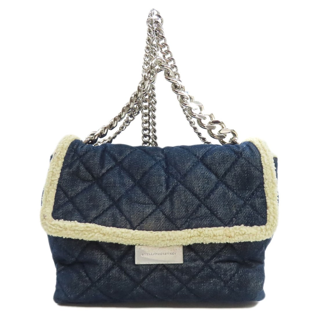 Chainshoulder Handbag McCartney Stella Denim: Chainshoulder Handbag McCartney Stella Denim Navy denim handbag with chain shoulder straps, designed by Stella McCartney. This stylish bag features a unique denim exterior and chain details that add