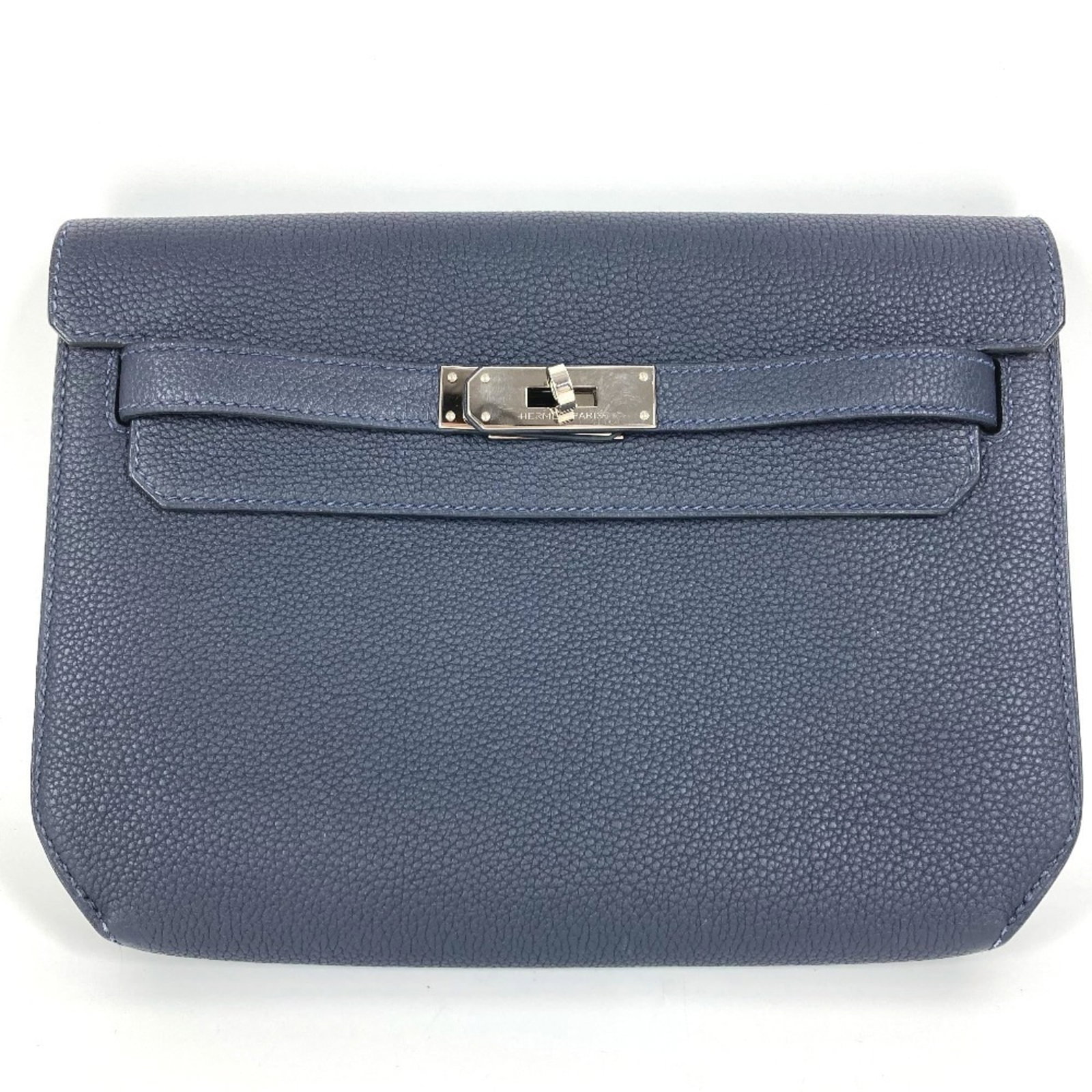 Clutch Togo Leather Hermes Bag: Clutch Togo Leather Hermes Bag Togo Leather Clutch Bag from Hermes in Navy, featuring silver hardware and a classic design. This used clutch bag is in very good condition with some minor scratches and