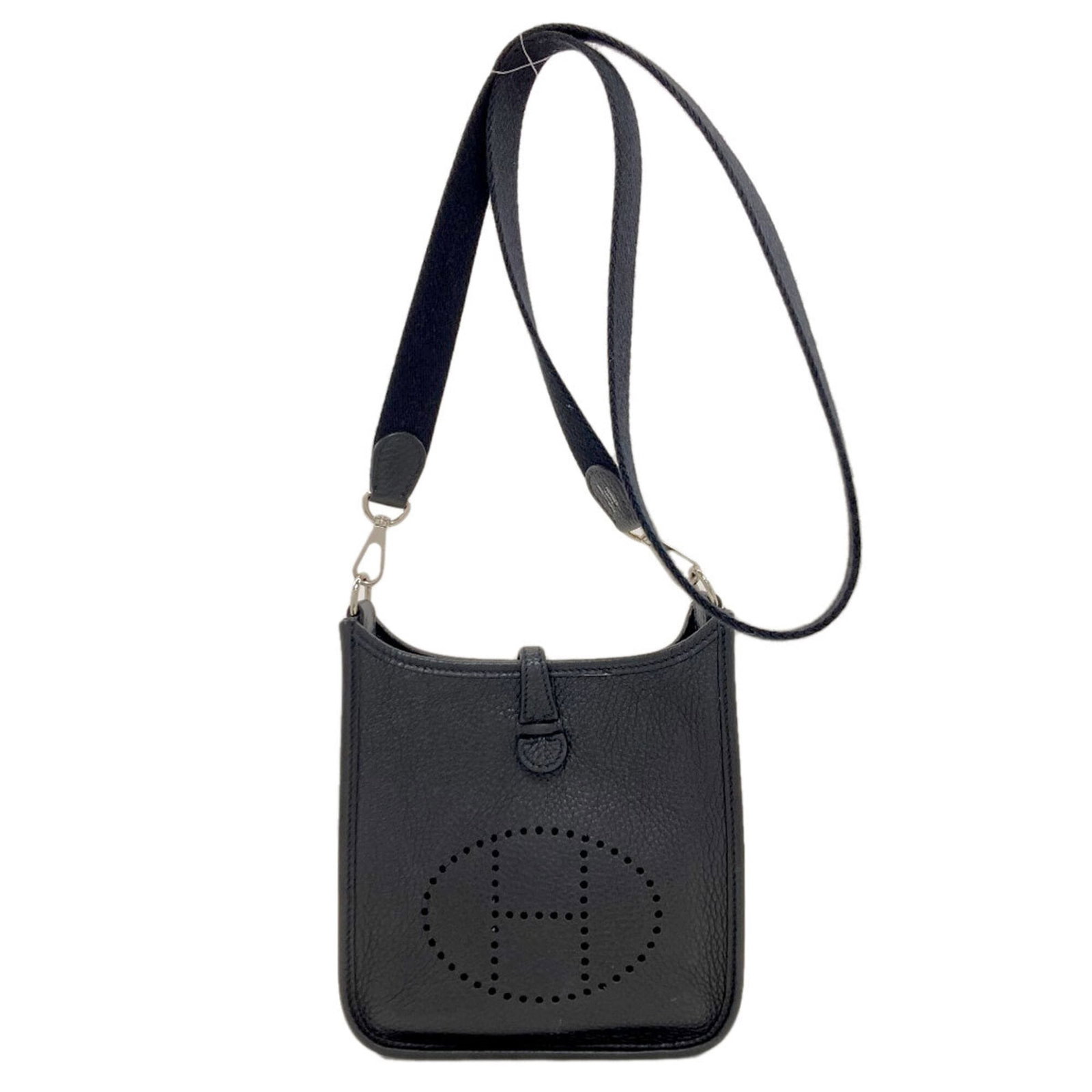 Shoulder Bag by Hermes: Shoulder Bag by Hermes Black shoulder bag by Hermes, measuring 18cm x 16cm x 5cm, features a 107cm long handle. The bag has some scratches and dirt, but remains in very good condition with only a few