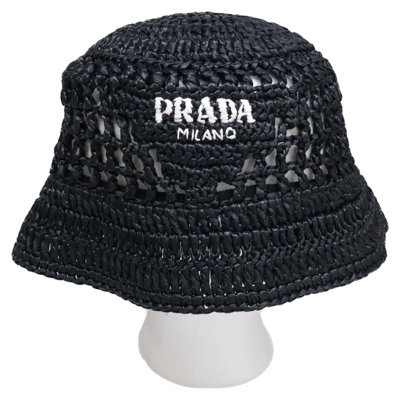 Prada Bucket Hat Viscose: Prada Bucket Hat Viscose Black Prada Bucket Hat made from Viscose material, featuring a few traces of usage with minor scratches and dirt. The hat is in very good condition overall, showing signs of n