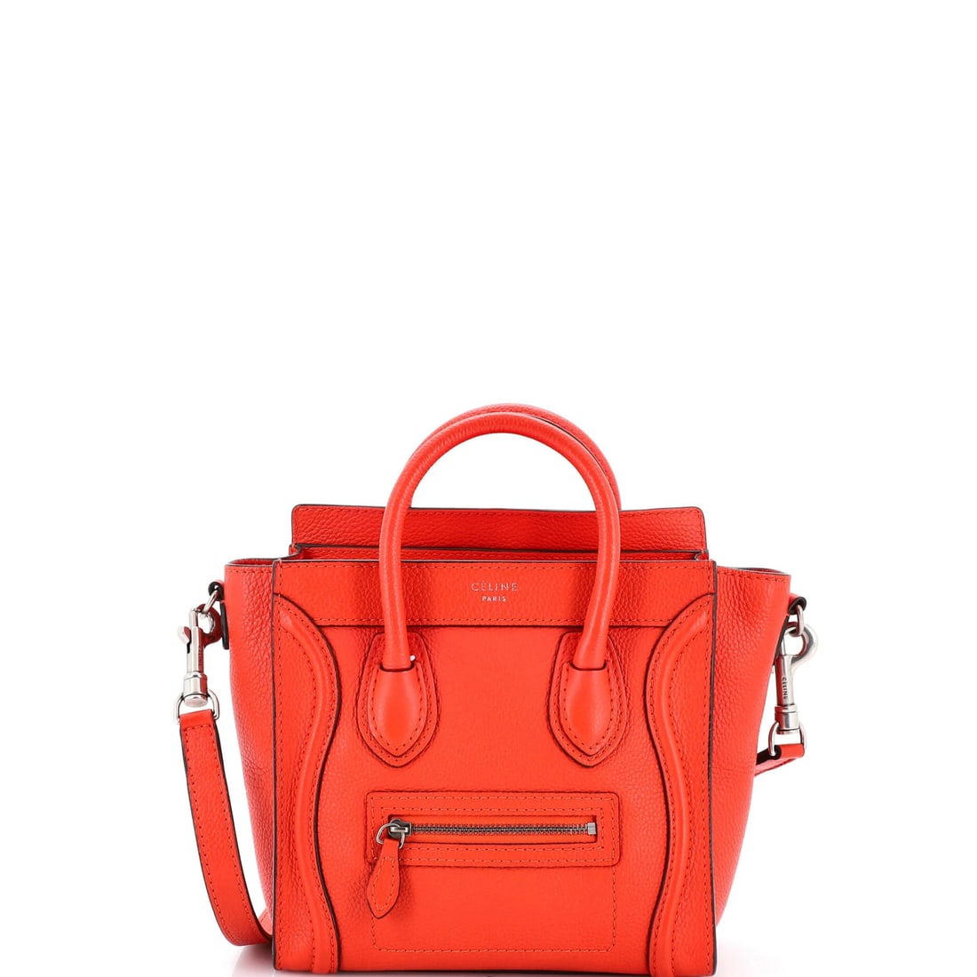 Celine Luggage Bag Smooth Leather Nano: Celine Luggage Bag Smooth Leather Nano The Celine Luggage Bag Smooth Leather Nano boasts sleek, red leather exterior with aged silver hardware. Measuring just 8" in width and 4" in depth, this
