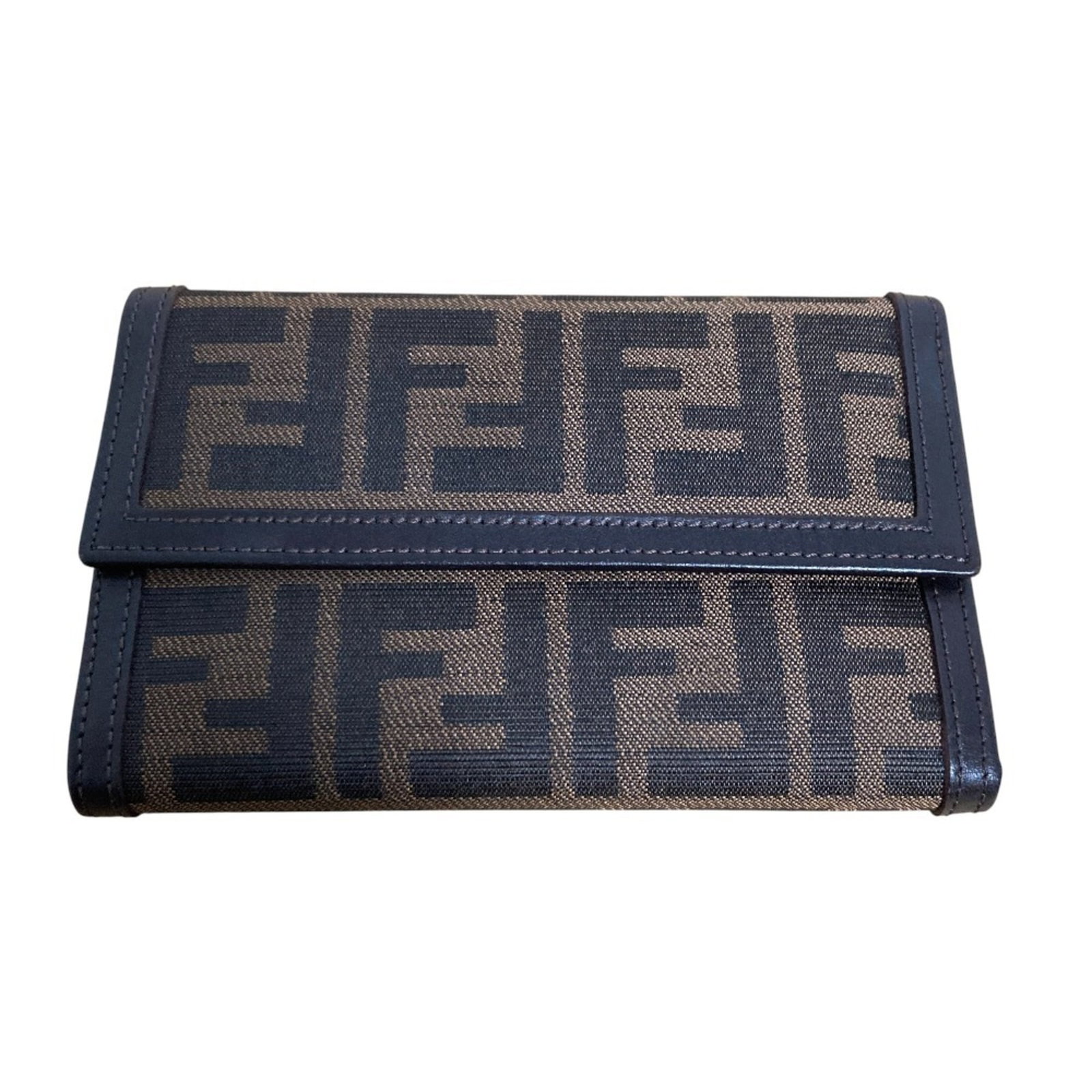 Zucca wallet tri-fold by Fendi: Zucca wallet tri-fold by Fendi Zucca wallet tri-fold by Fendi, in brown, features a unique material and stylish design. This used item has hardly any traces of usage and is presented as like new or