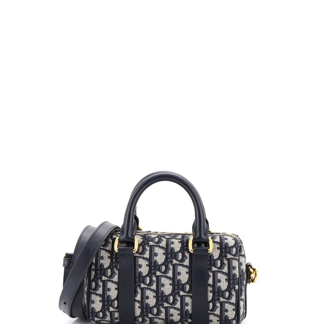Christian Dior Nano Oblique Canvas Bowling Convertible Bag: Christian Dior Nano Oblique Canvas Bowling Convertible Bag The Christian Dior Nano Oblique Canvas Bowling Convertible Bag boasts sleek, blue canvas exterior with oblique design elements. Measuring