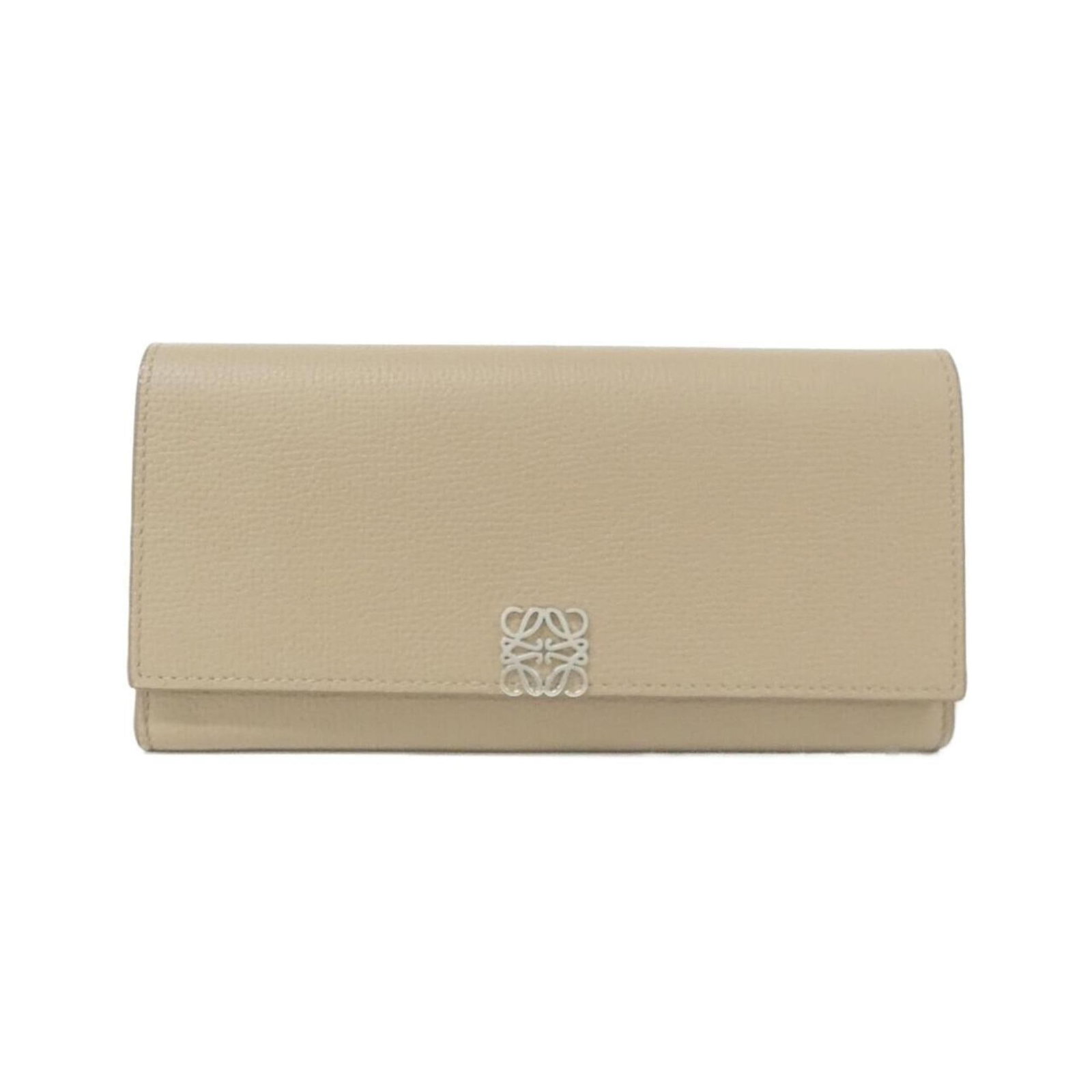 Loewe Long Wallet (Bi-Fold) Leather: Loewe Long Wallet (Bi-Fold) Leather The Loewe Long Wallet in Sand features a classic bi-fold design made from high-quality calfskin leather. With its timeless elegance and understated sophistication,