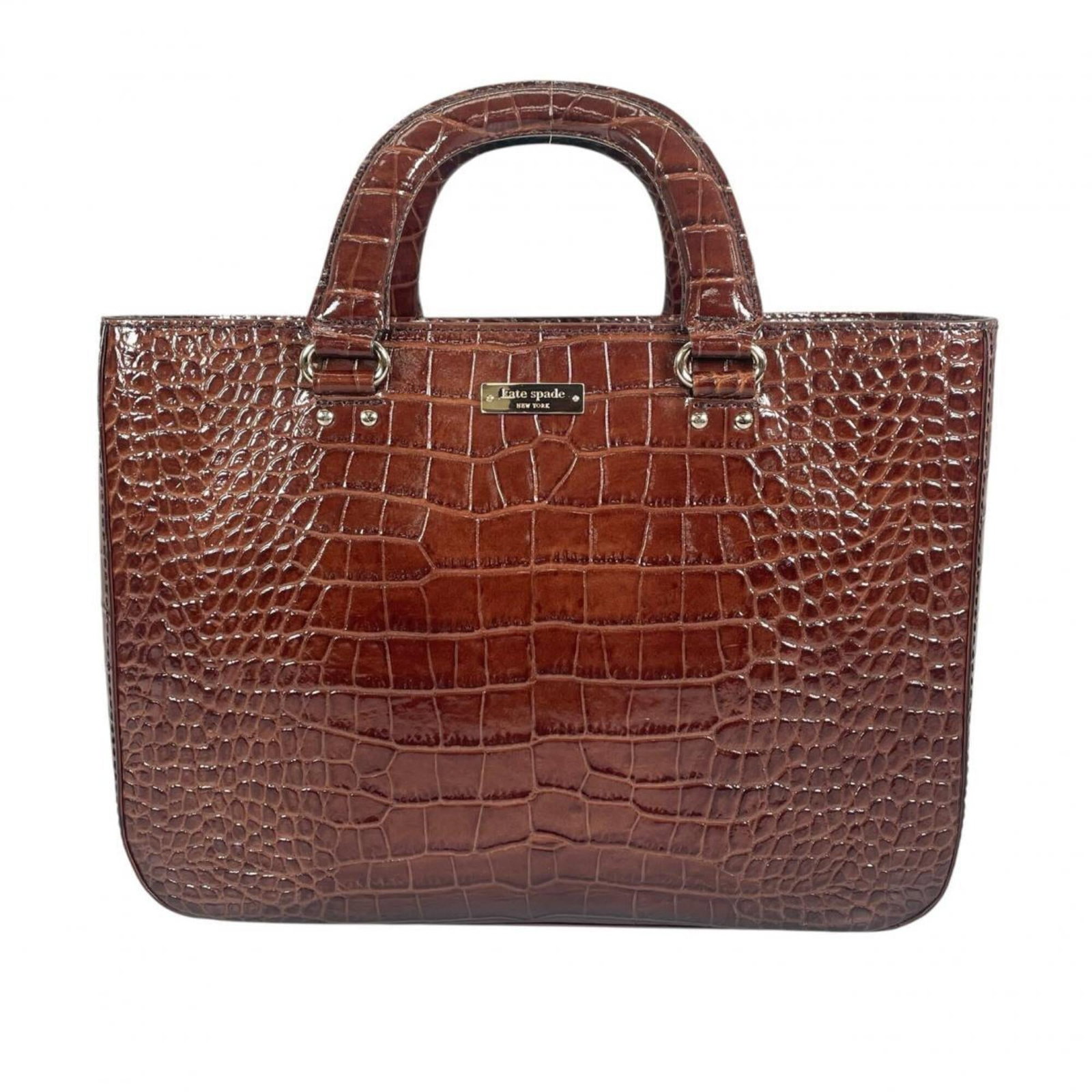 Kate Spade handbag leather: Kate Spade handbag leather Brown Kate Spade handbag made from high-quality leather, featuring an open outer pocket and adjustable handle. The bag measures 23cm x 33cm x 12cm and weighs 700g, with a fe