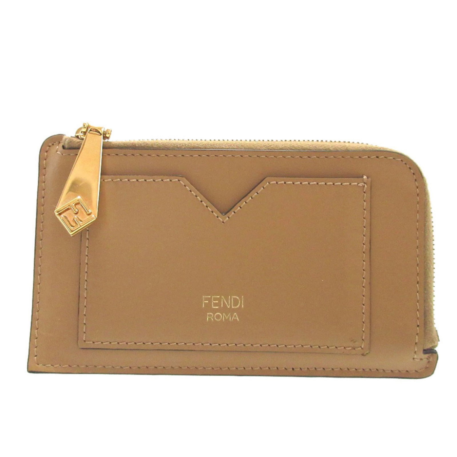 Card Case Leather by Fendi: Card Case Leather by Fendi Fendi's Card Case Leather features a classic design with a timeless beige color. Made from high-quality leather, it shows signs of gentle use and has minor scratches and dir