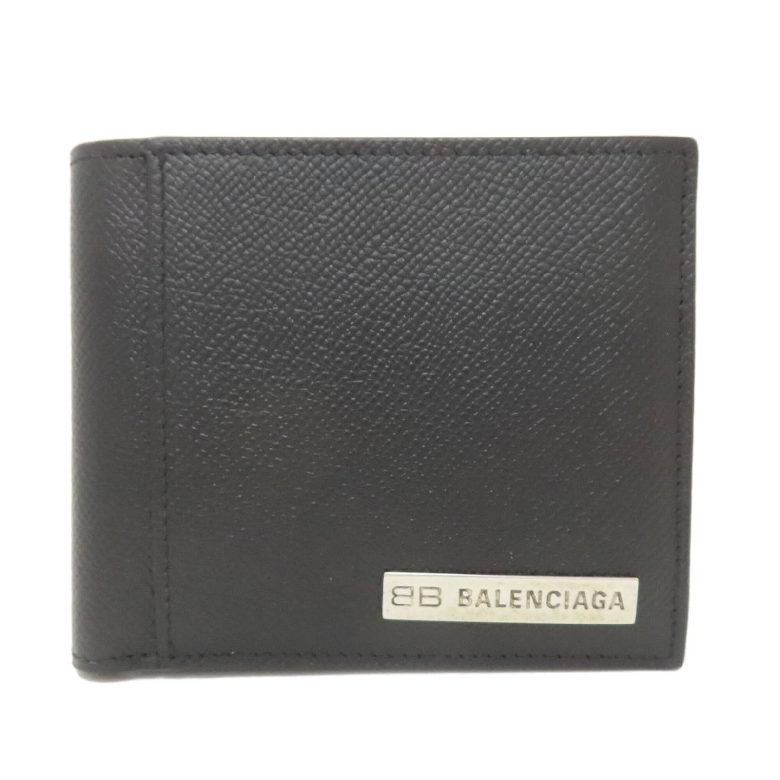 Balenciaga Wallet (Bi-Fold) Leather: Balenciaga Wallet (Bi-Fold) Leather Black leather bi-fold wallet from Balenciaga with a classic design and timeless style. The item has traces of usage, scratches, and dirt but remains in good
