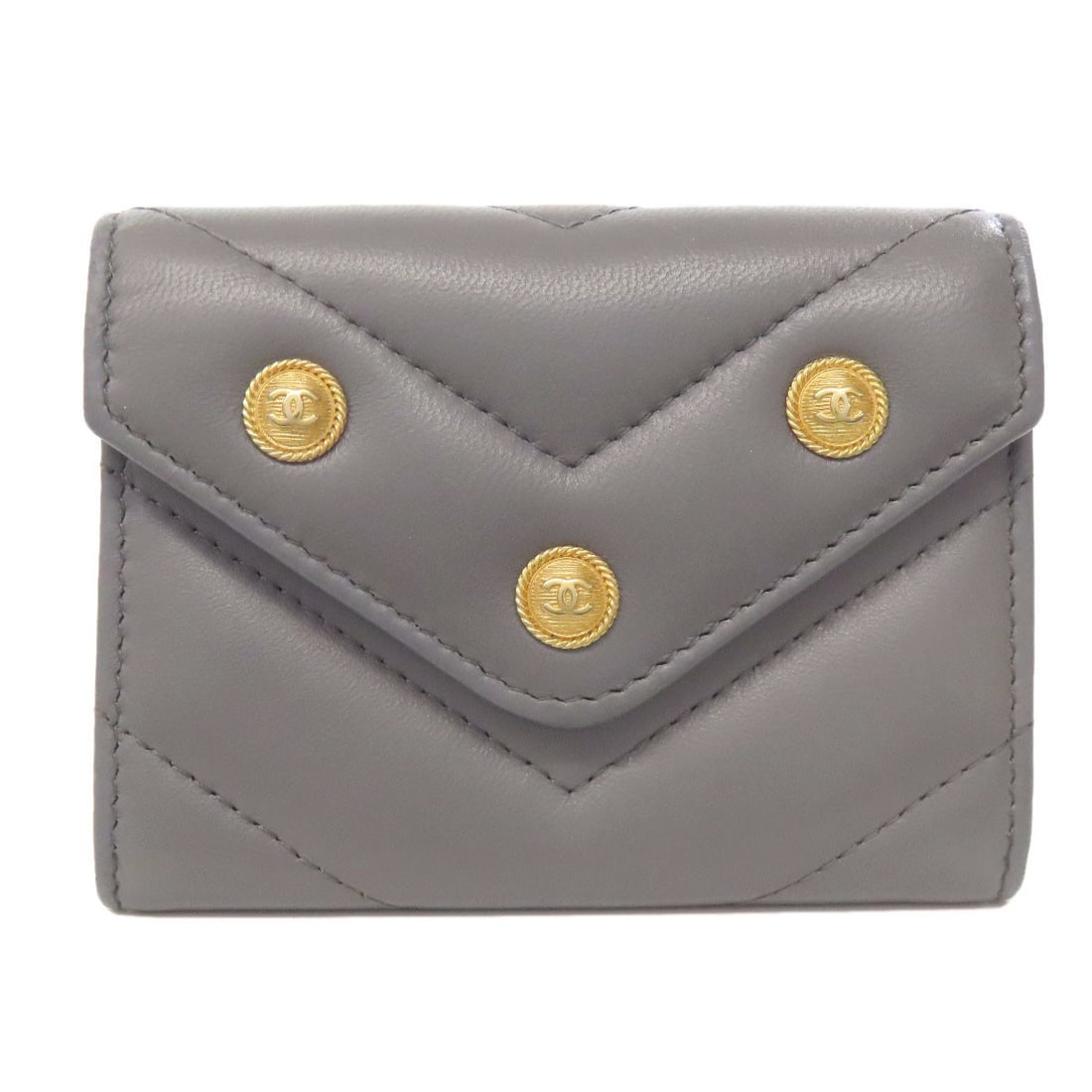 Chanel Coco Mark V Stitch Goldhardware Coin Purse Lambskin: Chanel Coco Mark V Stitch Goldhardware Coin Purse Lambskin Gray lambskin coin purse with gold hardware, featuring the iconic Coco Mark V stitch design. This stylish and elegant purse showcases a