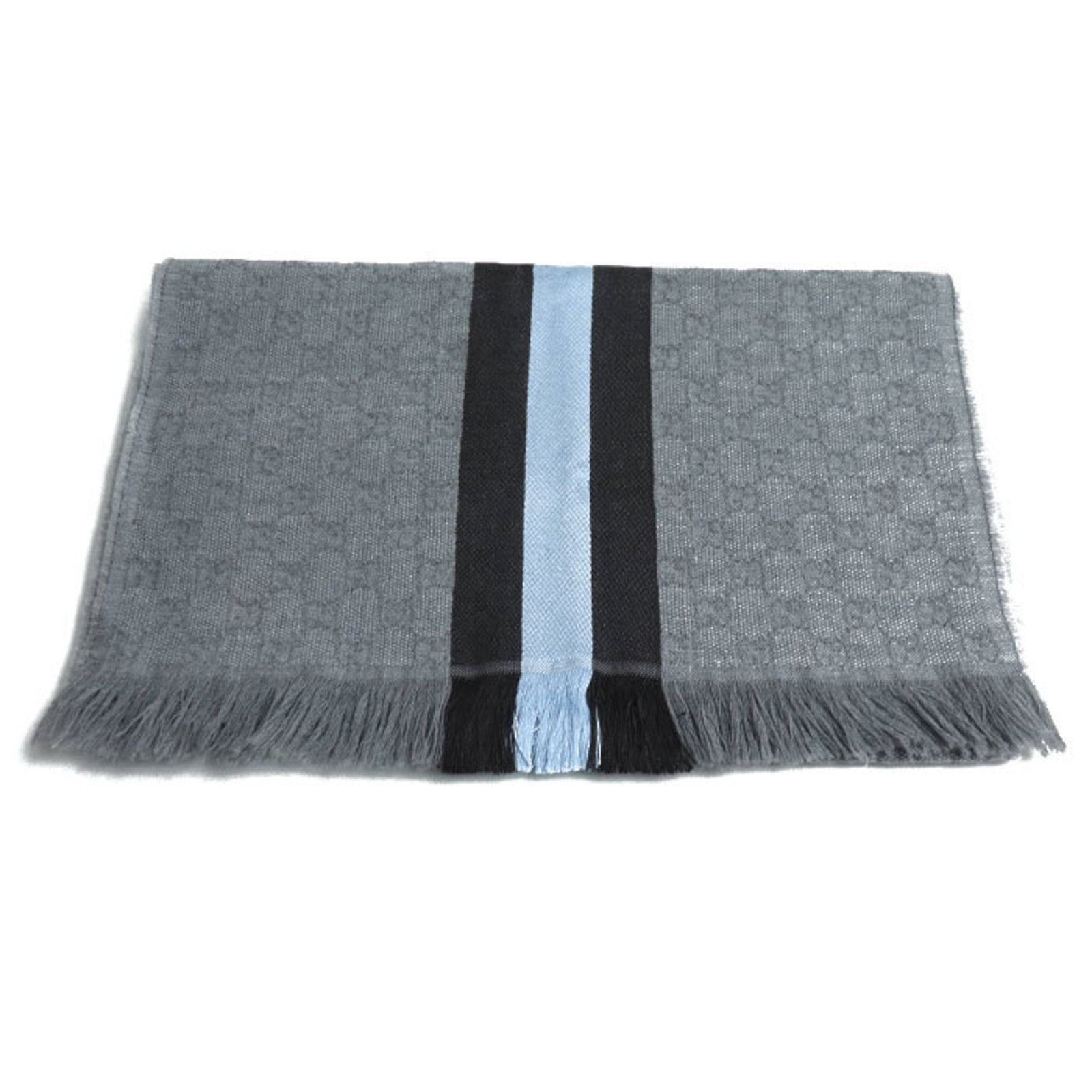 Silk Stole Gucci Wool 80%: Silk Stole Gucci Wool 80% Silk and wool blend in rich brown tones, featuring the iconic Gucci design. This luxurious stole boasts an impressive 80% wool content, paired with a touch of silk for added