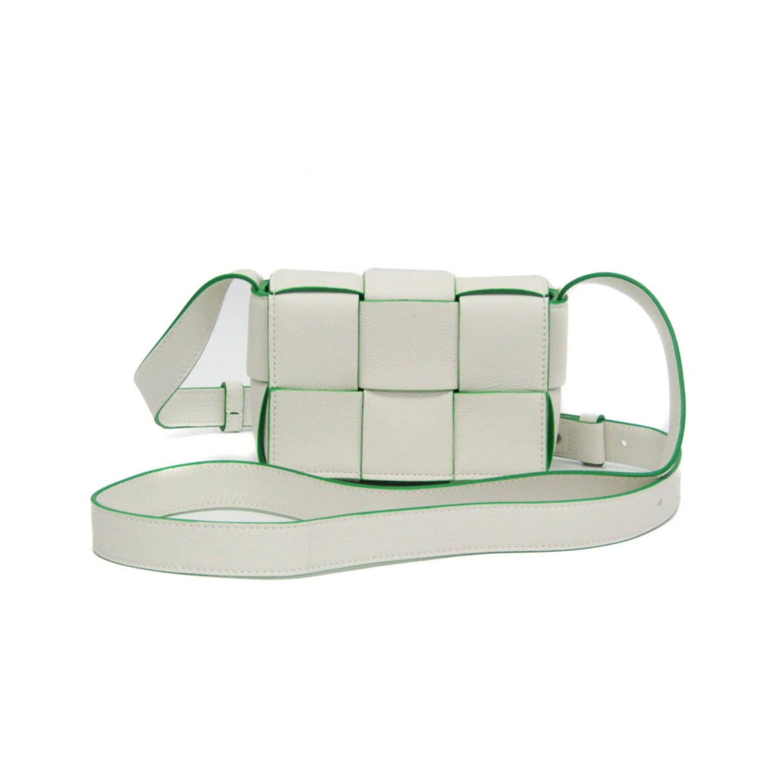 Veneta Leather Bag Shoulder: Veneta Leather Bag Shoulder The Veneta Leather Bag Shoulder boasts a sleek, all-green design with a crisp white accent. With its spacious open pocket and magnetic closure, this versatile bag offers