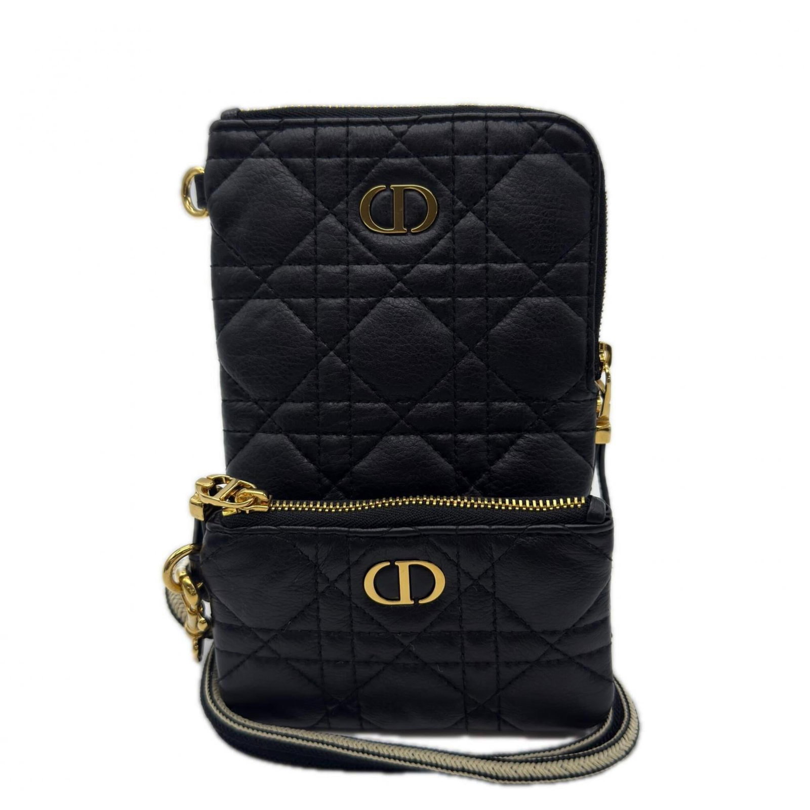 Christian Dior Shoulder Bag Leather: Christian Dior Shoulder Bag Leather Black and White Christian Dior Shoulder Bag Leather, featuring Calfskin material, zipper closure, and adjustable strap length. This used shoulder bag has traces of