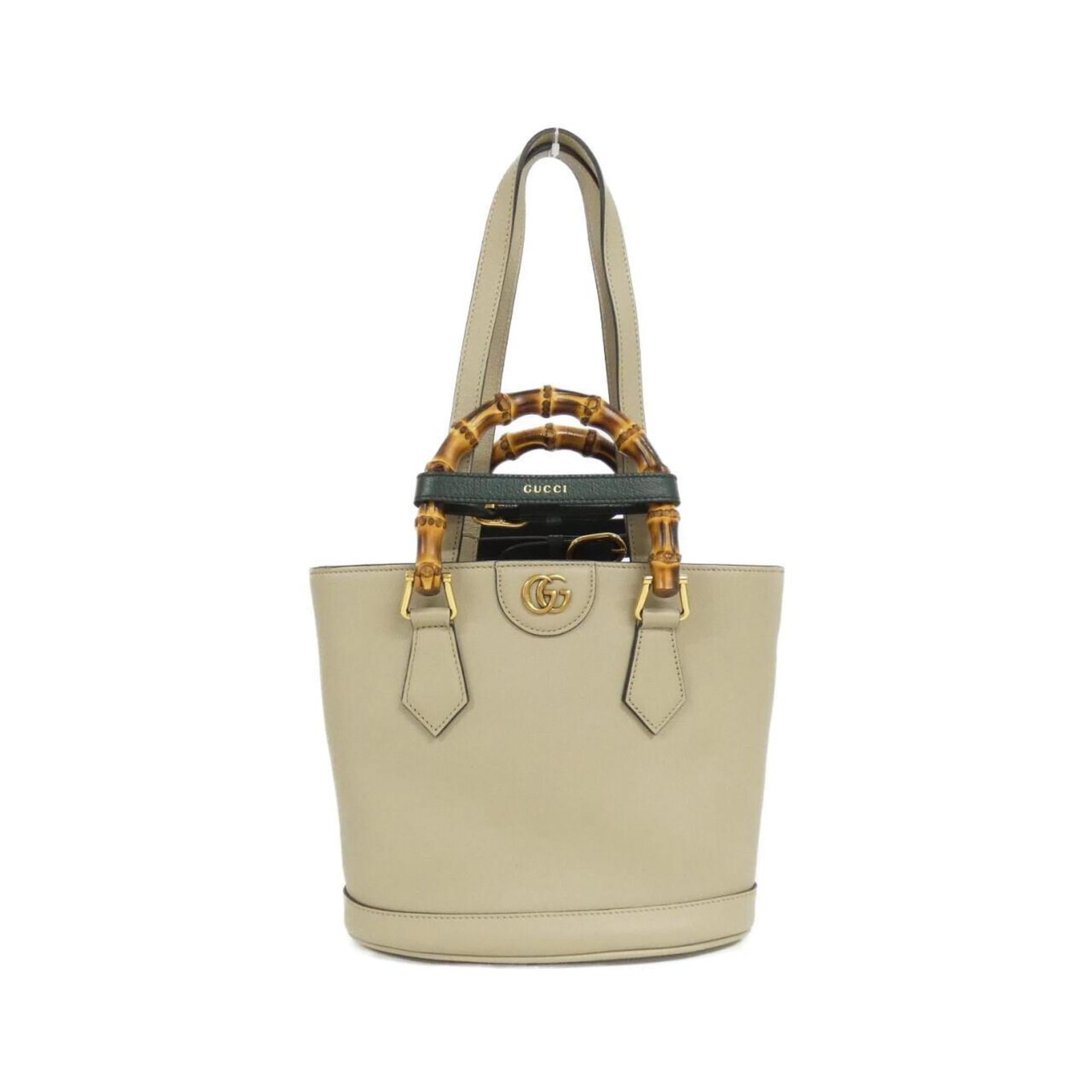 Handbag Leather Gucci: Handbag Leather Gucci Beautifully crafted in rich beige leather, this Gucci handbag boasts elegant gold hardware and a timeless design. With its sturdy 24cm handle and adjustable strap, it's the perfe