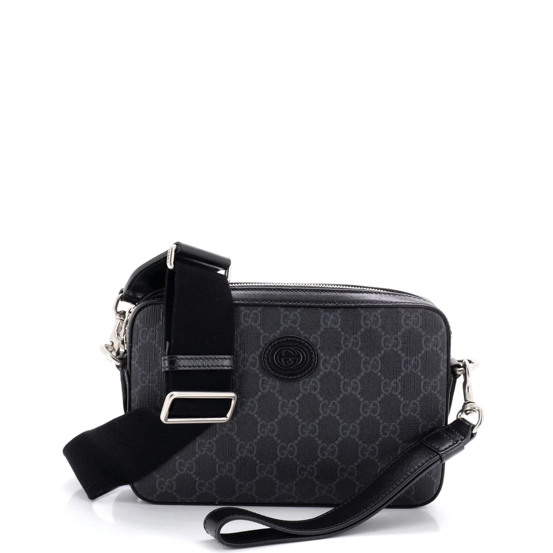 Gucci Interlocking G patch small canvas bag GG coated: Gucci Interlocking G patch small canvas bag GG coated Small canvas bag with interlocking G patch, featuring GG coated exterior in black. The bag measures 6" tall and has a 9.5" wide strap drop,