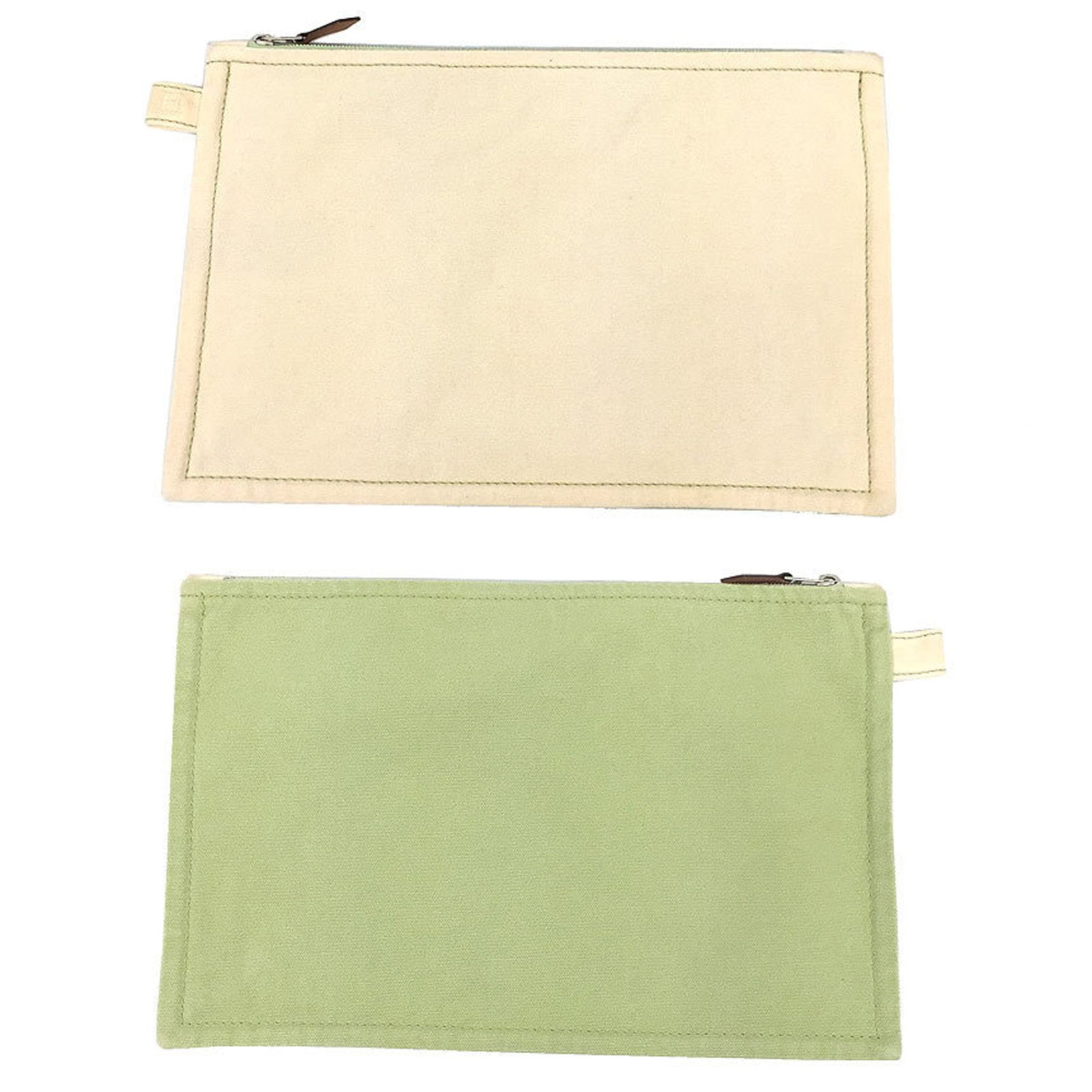 Cotton canvas pouch clutch bag by Hermes: Cotton canvas pouch clutch bag by Hermes Cotton canvas pouch clutch bag by Hermes, featuring a classic cream and lime green color combination. Made from high-quality cotton canvas, this versatile bag 