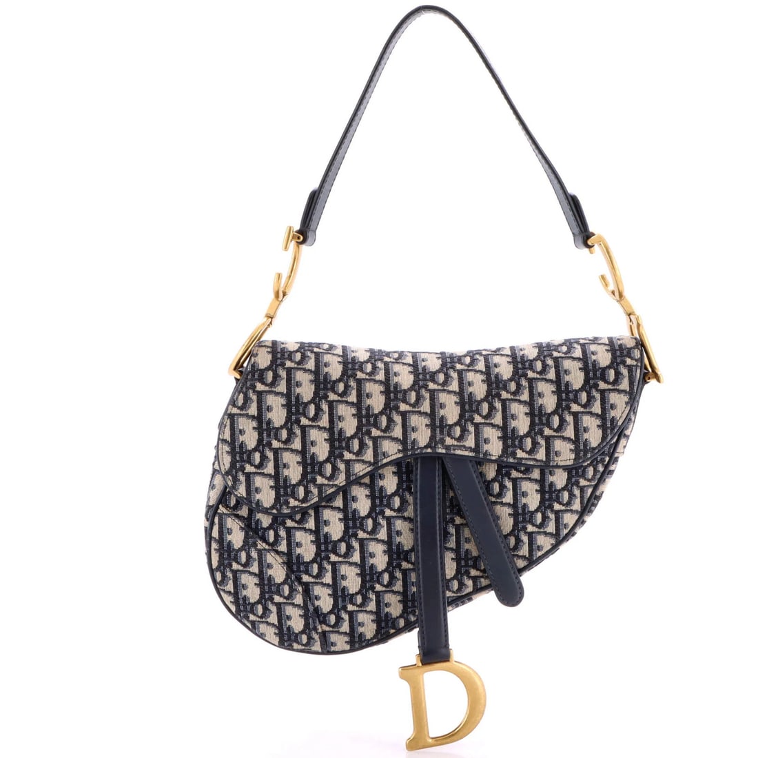 Canvas handbag saddle medium oblique Christian Dior: Canvas handbag saddle medium oblique Christian Dior Canvas handbag in blue oblique saddle medium style from Christian Dior, featuring plain canvas exterior and neutral interior. Minor creases on