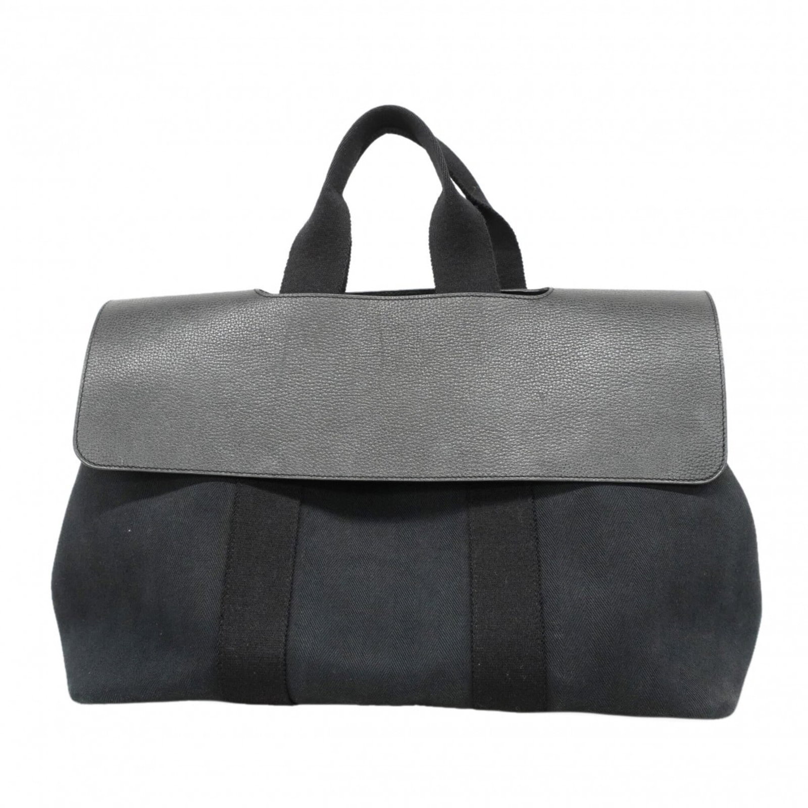 Toile Handbag To Hermes Chevron: Toile Handbag To Hermes Chevron Toile Chevron Handbag by Hermes in Black. This iconic handbag features the classic Toile de Jouy design, a signature motif of the French luxury brand. With its sleek
