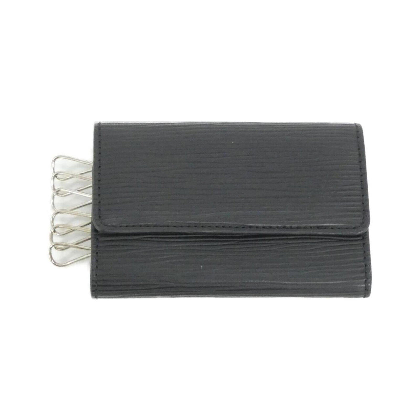 Louis Vuitton Keycase Leather: Louis Vuitton Keycase Leather Black Louis Vuitton Keycase Leather, made from high-quality Calf Leather, features a classic design with some subtle signs of usage. The leather has developed a few