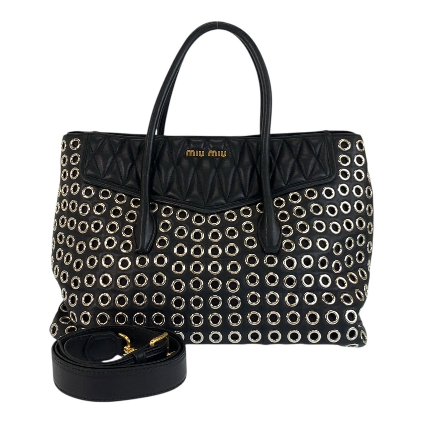 Miu Bag Leather Tote Bag Shoulder: Miu Bag Leather Tote Bag Shoulder Miu Miu leather tote bag with classic shoulder design, featuring black leather construction and timeless style. The bag has some traces of usage, including scratches