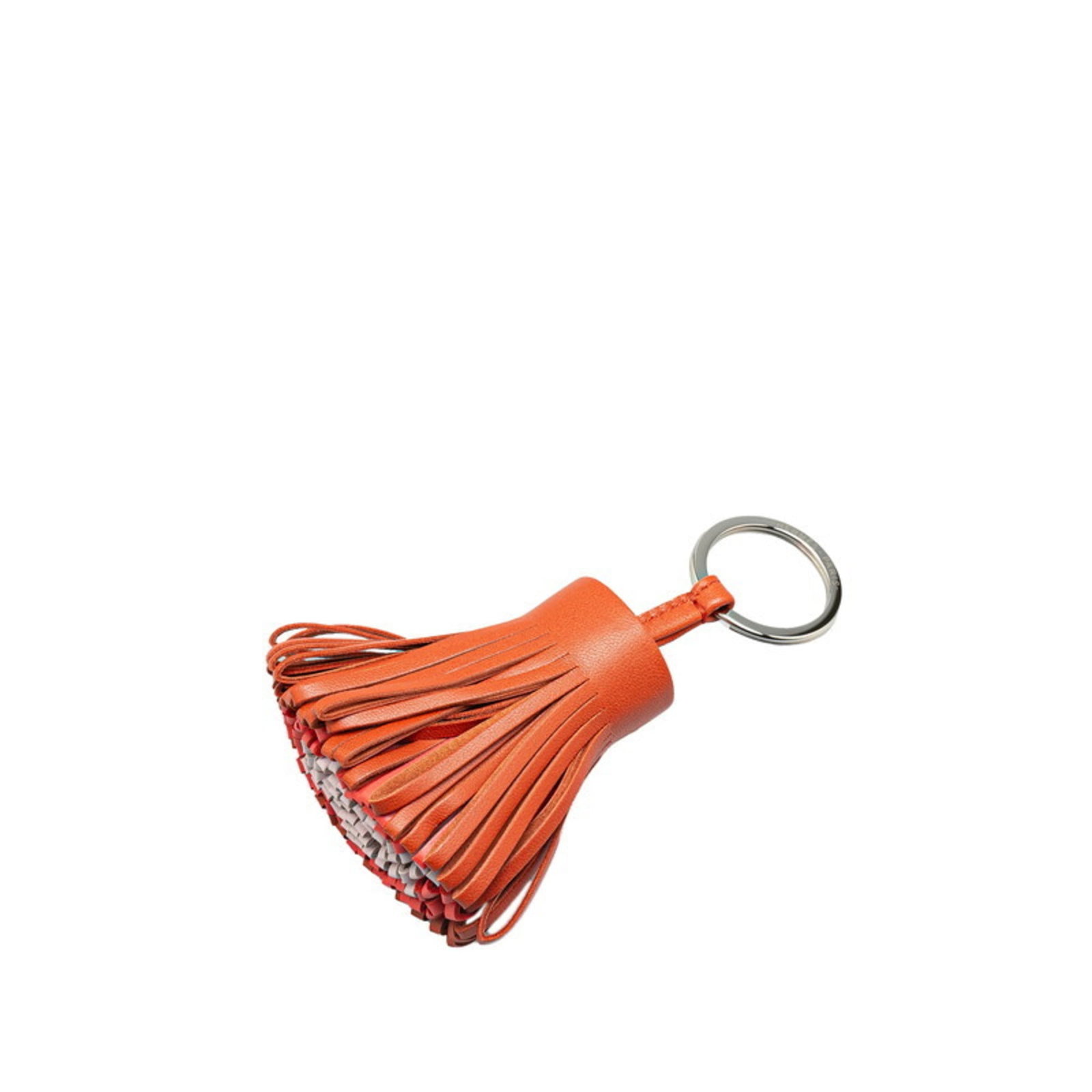 Agneau Keyring Hermes Milo: Agneau Keyring Hermes Milo Agneau Milo keyring from Hermes features a delicate design with a few traces of usage, some scratches and dirt visible. The material remains in very good condition despite