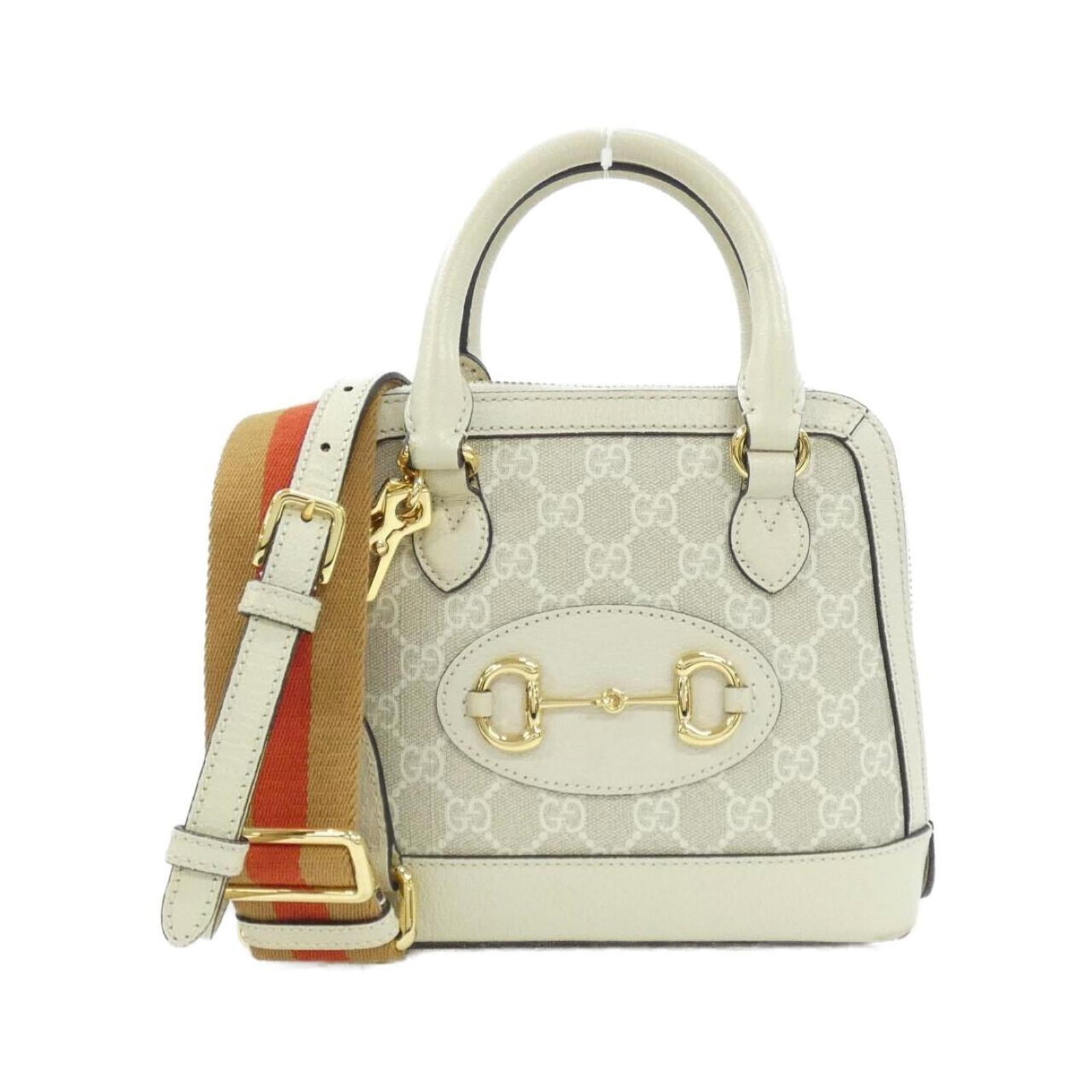 Handbag Supreme Gg Gucci: Handbag Supreme Gg Gucci Gucci's iconic Supreme Gg handbag boasts a timeless beige and white color combination, accented by gold hardware. Measuring 18cm x 20cm x 7cm, this versatile bag features a st