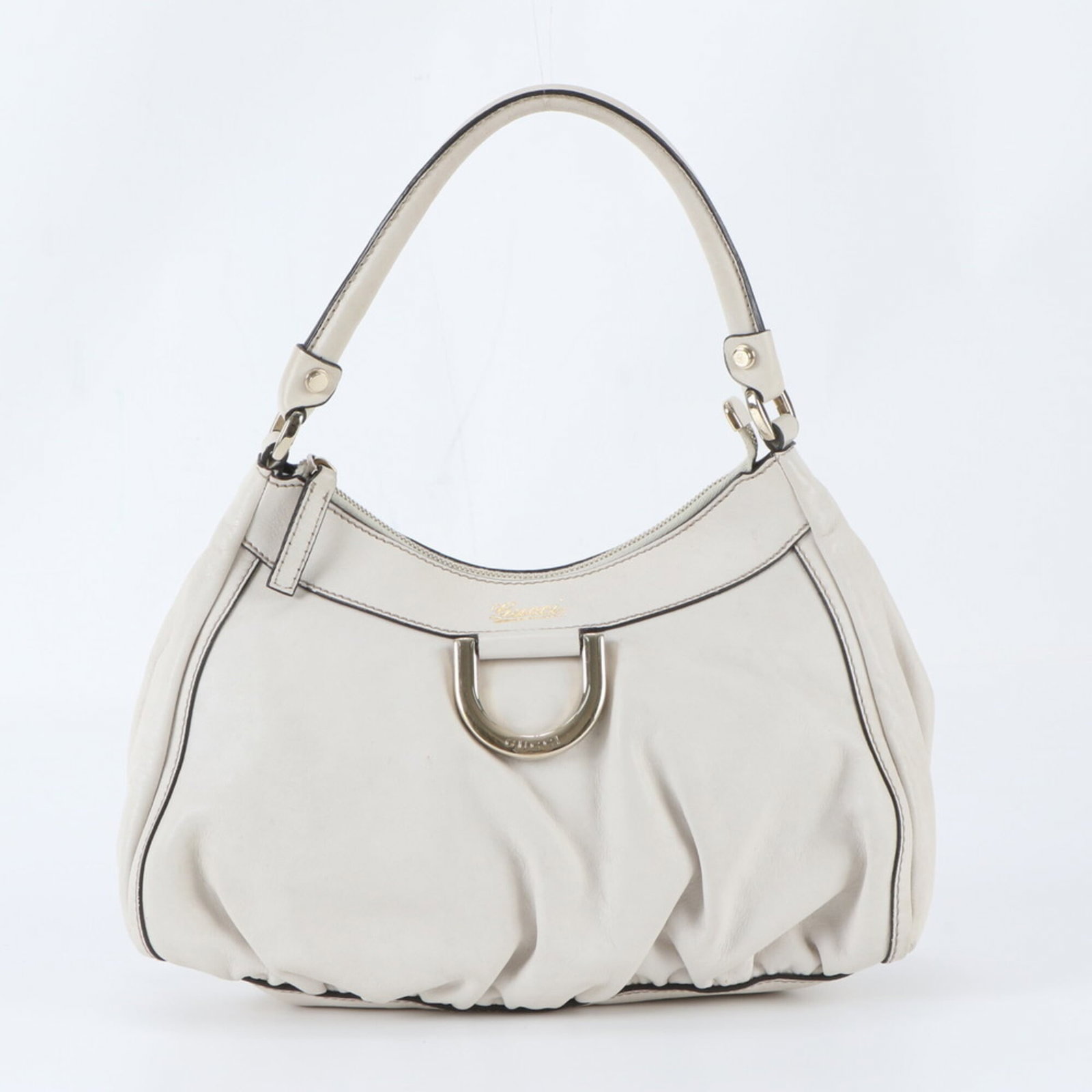 Gucci Handbag Shoulder Bag Leather: Gucci Handbag Shoulder Bag Leather The Gucci Handbag Shoulder Bag Leather features an ivory leather exterior with a classic design, measuring 21cm x 29cm x 9cm. With its 38cm strap length and used con