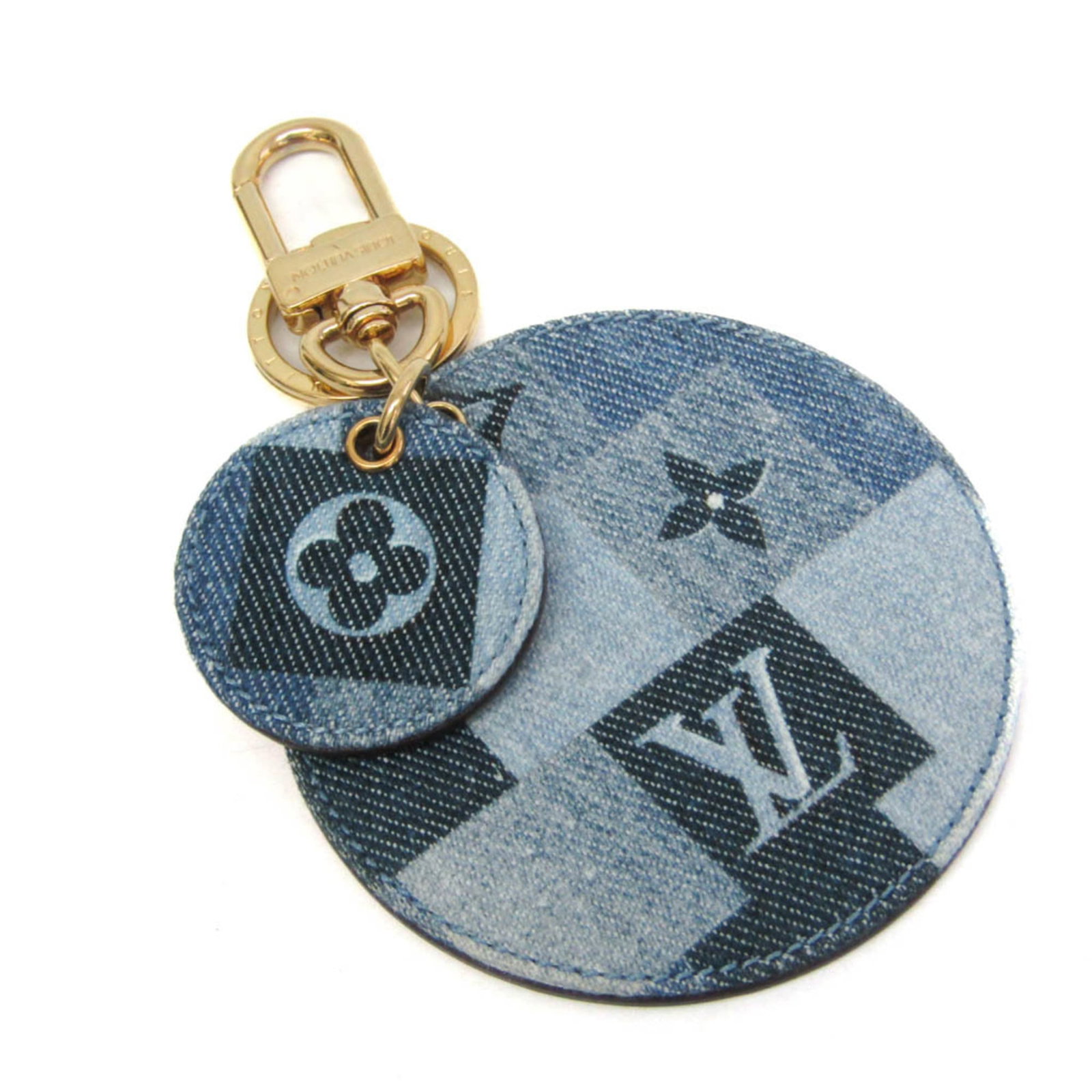Canvas leather metal keyring Louis Vuitton: Canvas leather metal keyring Louis Vuitton Canvas leather metal keyring in iconic Louis Vuitton blue and red hues, featuring a durable canvas base, supple leather accents, and metallic details. This