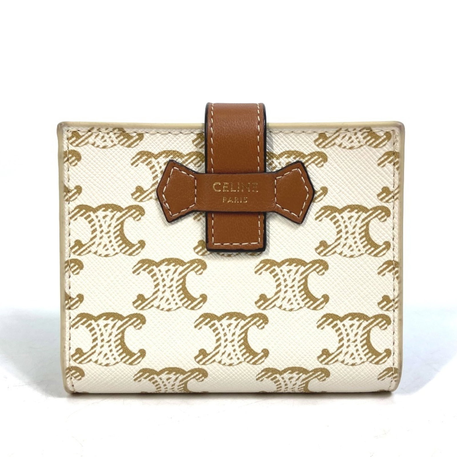 Celine Bi Fold Pvc Leather Wallet: Celine Bi Fold Pvc Leather Wallet Celine Bi Fold Pvc Leather Wallet in Brown and White. This bi-fold wallet features pvc leather and brown, white color combination with a size of 8.5cm x 10.5cm. Used