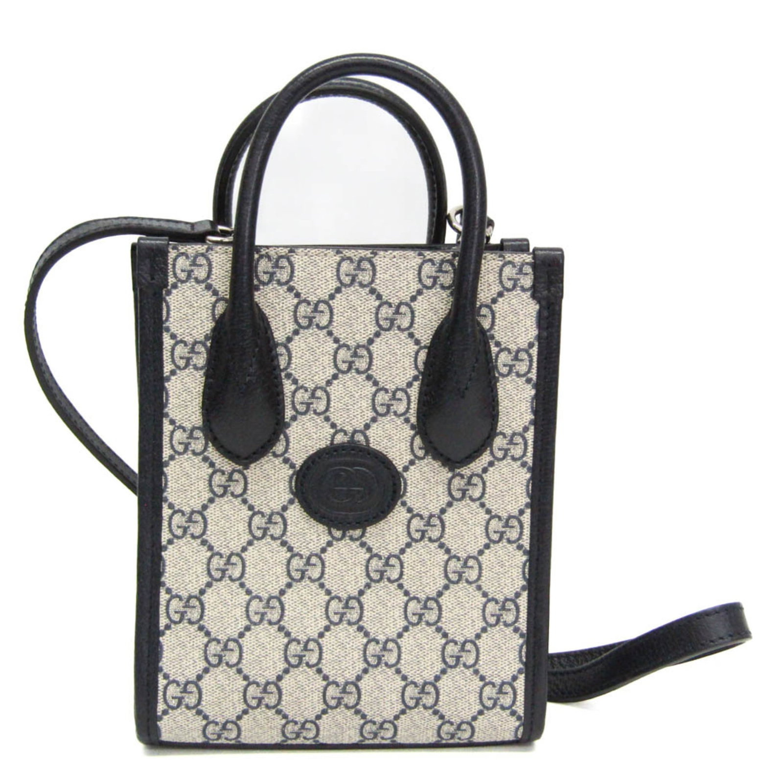 Gucci leather handbag supreme GG shoulder bag: Gucci leather handbag supreme GG shoulder bag Gucci leather handbag supreme GG shoulder bag in beige and dark navy, featuring an open interior with one large pocket. This stylish shoulder bag measures