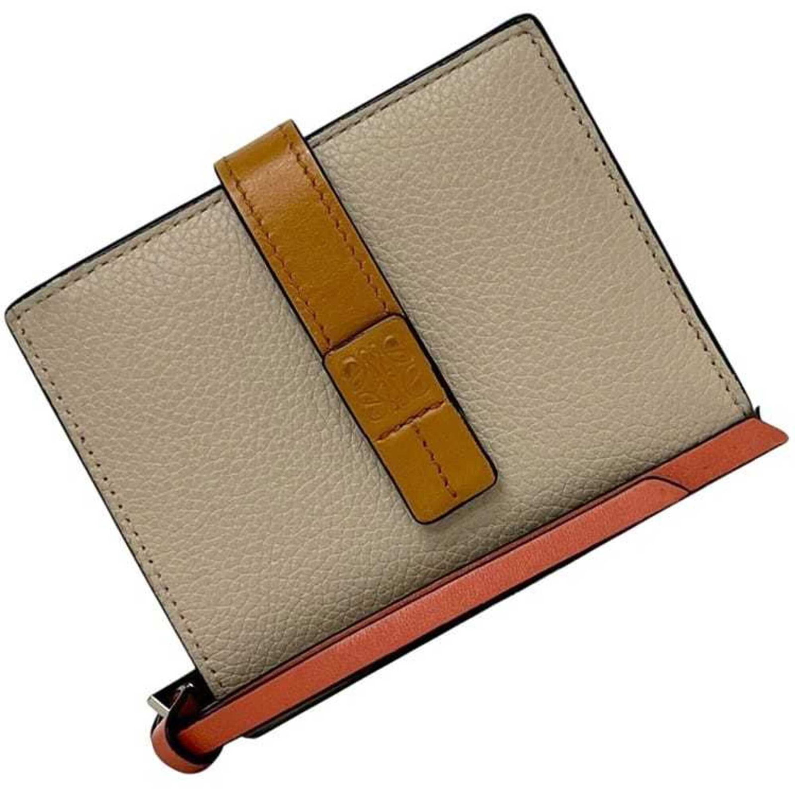 Loewe Wallet (Bi-Fold) Leather: Loewe Wallet (Bi-Fold) Leather This used Loewe bi-fold leather wallet has a classic design and a natural beige color. It features a sturdy construction with a size that fits comfortably in the hand,