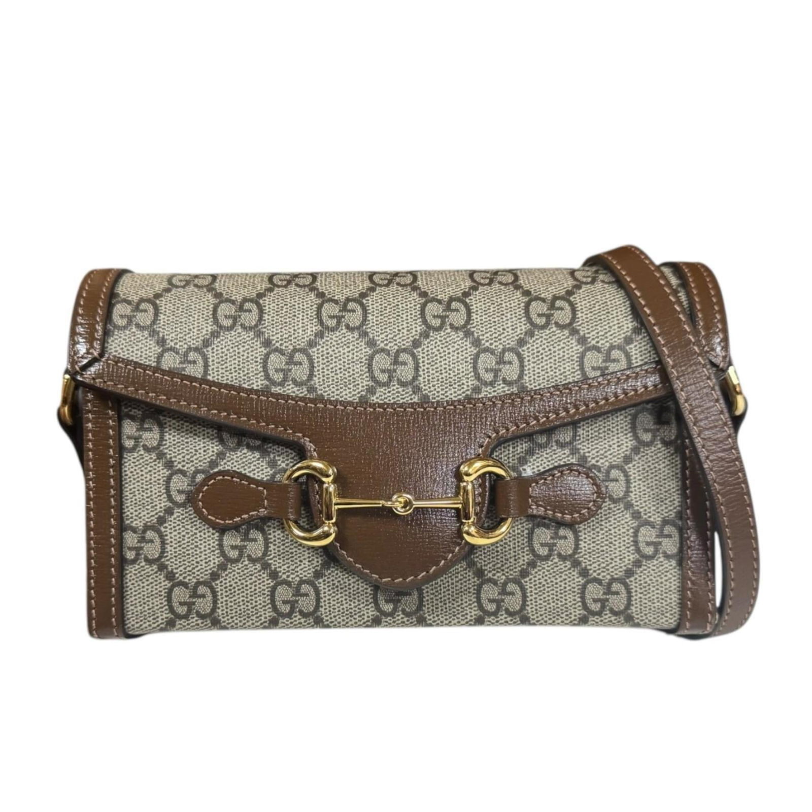 Gucci supreme shoulder bag: Gucci supreme shoulder bag Gucci supreme shoulder bag in beige and brown, featuring a magnet closure. This used (very good) condition bag has some traces of usage with minor scratches and dirt, but