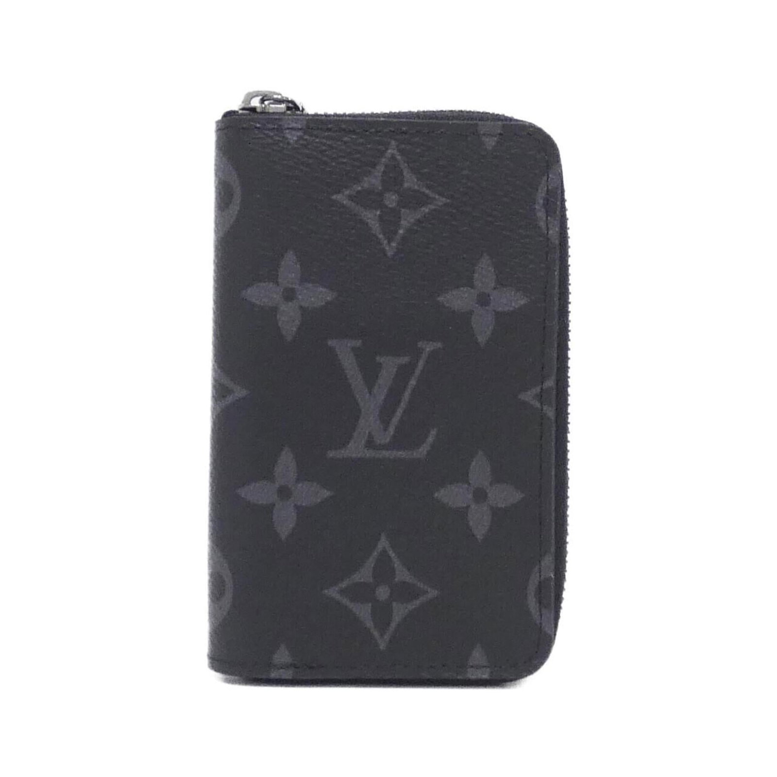 Louis Vuitton Coin Purse/ Coin Case Coated Canvas: Louis Vuitton Coin Purse/ Coin Case Coated Canvas Used Louis Vuitton Coin Purse/ Coin Case in Black Coated Canvas. Features the iconic Louis Vuitton design, with a few traces of usage and some minor s