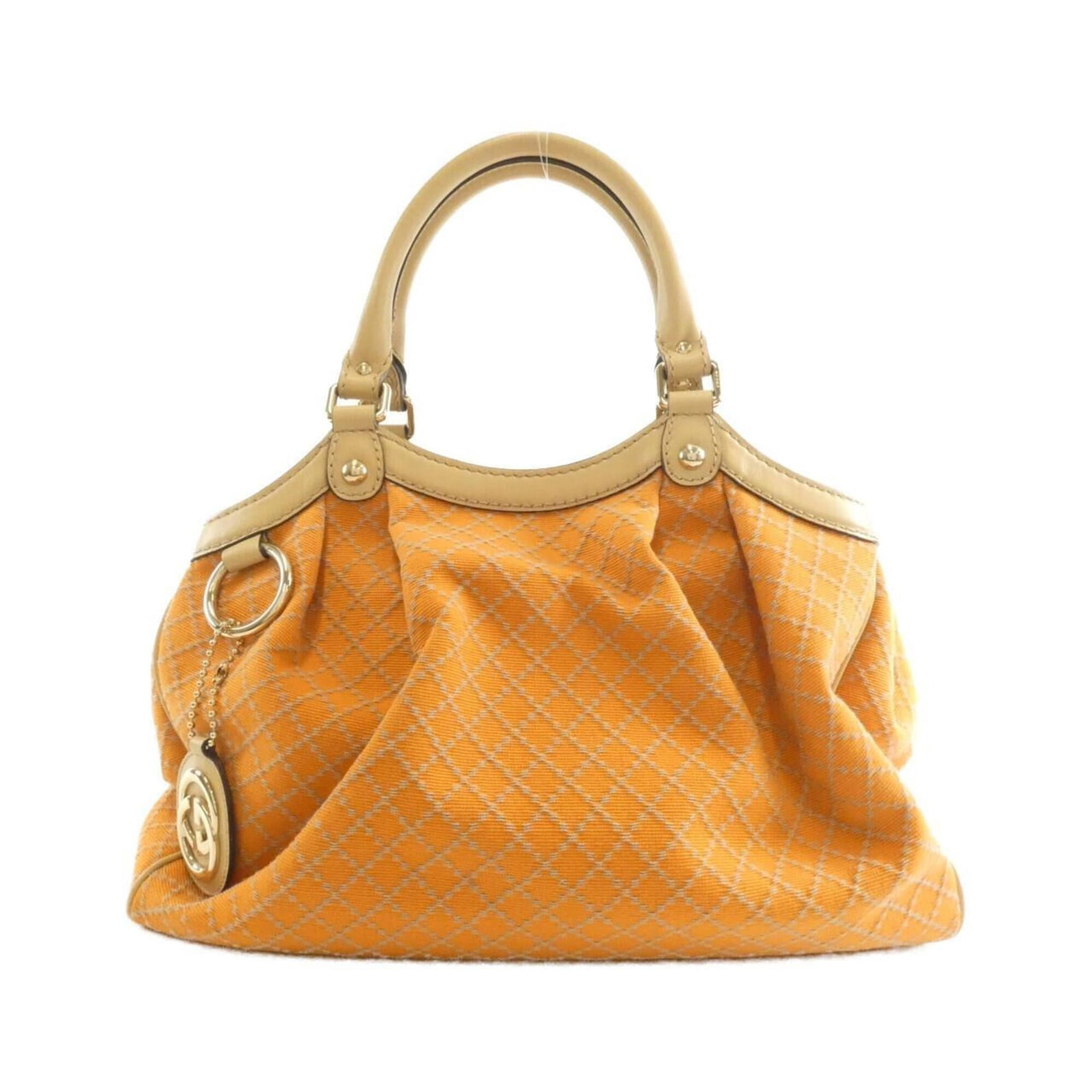 Canvas handbag Gucci: Canvas handbag Gucci This vibrant orange canvas handbag from Gucci boasts a striking gold hardware accent, adding a touch of luxury to its classic design. Measuring 25cm x 34cm x 10cm, it's the perfec