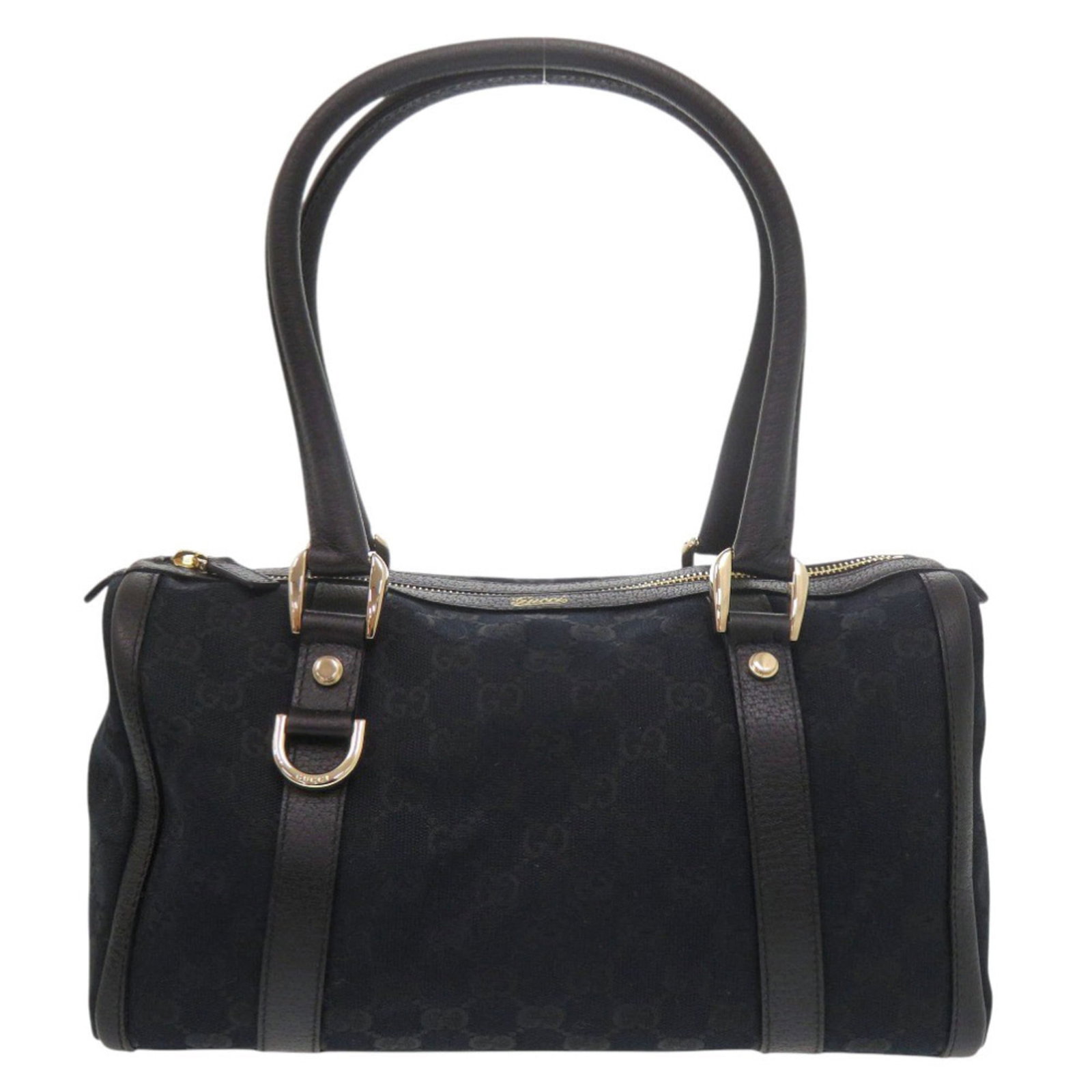 Canvas leather handbag by Gucci: Canvas leather handbag by Gucci Canvas leather handbag by Gucci, with its striking black canvas and gold hardware, offers a sophisticated touch to any outfit. Measuring 16cm x 29cm x 10.5cm, this vers