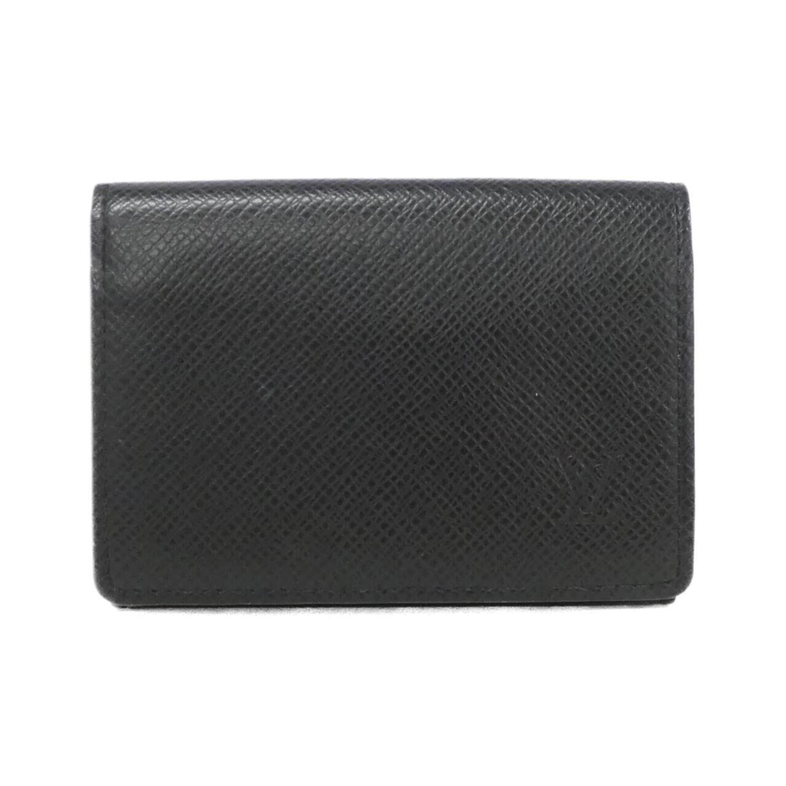 Case leather card Louis Vuitton: Case leather card Louis Vuitton Gray leather case from Louis Vuitton, made from high-quality calfskin. The card case has some scratches and dirt, but remains in very good condition with a few traces o